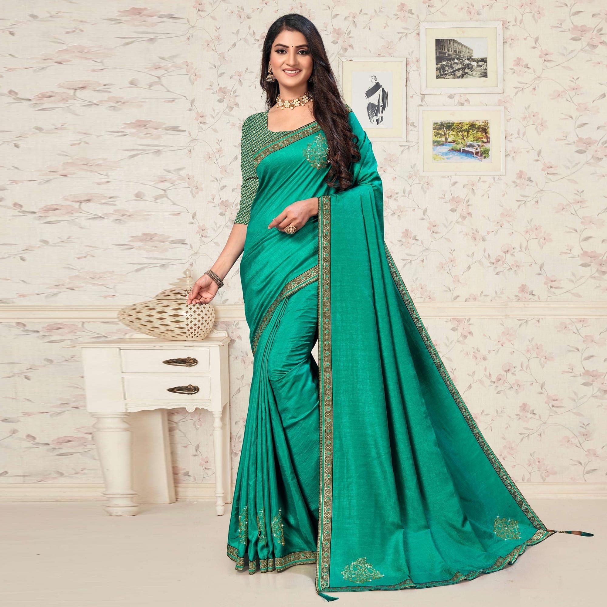 Turquoise Festive Wear Embellished Vichitra Silk Saree - Peachmode