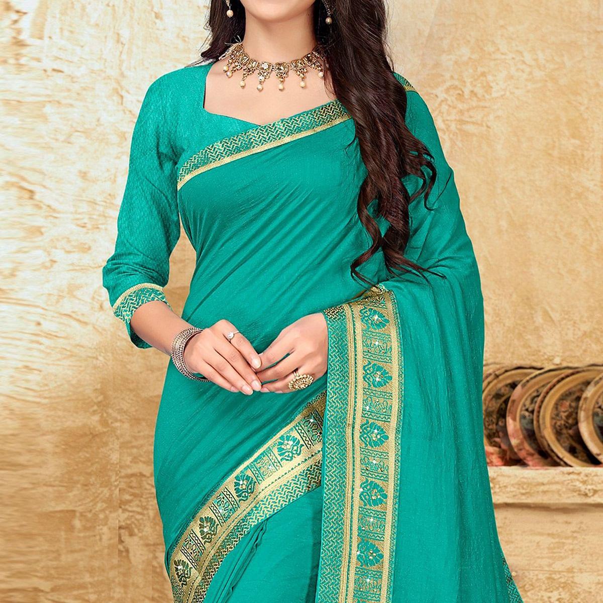 Turquoise Festive Wear Solid Vichitra Silk Saree - Peachmode