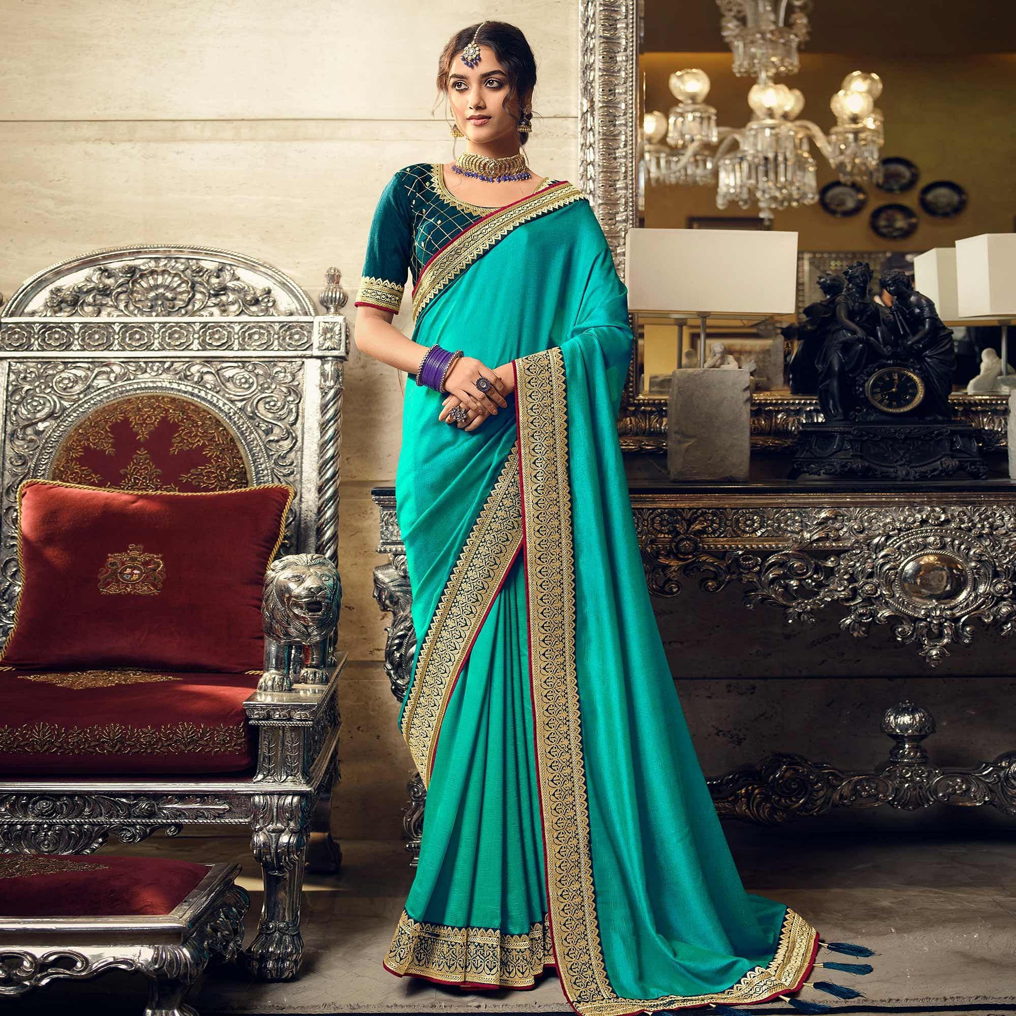Turquoise Partywear Embroidered Silk Saree - Peachmode