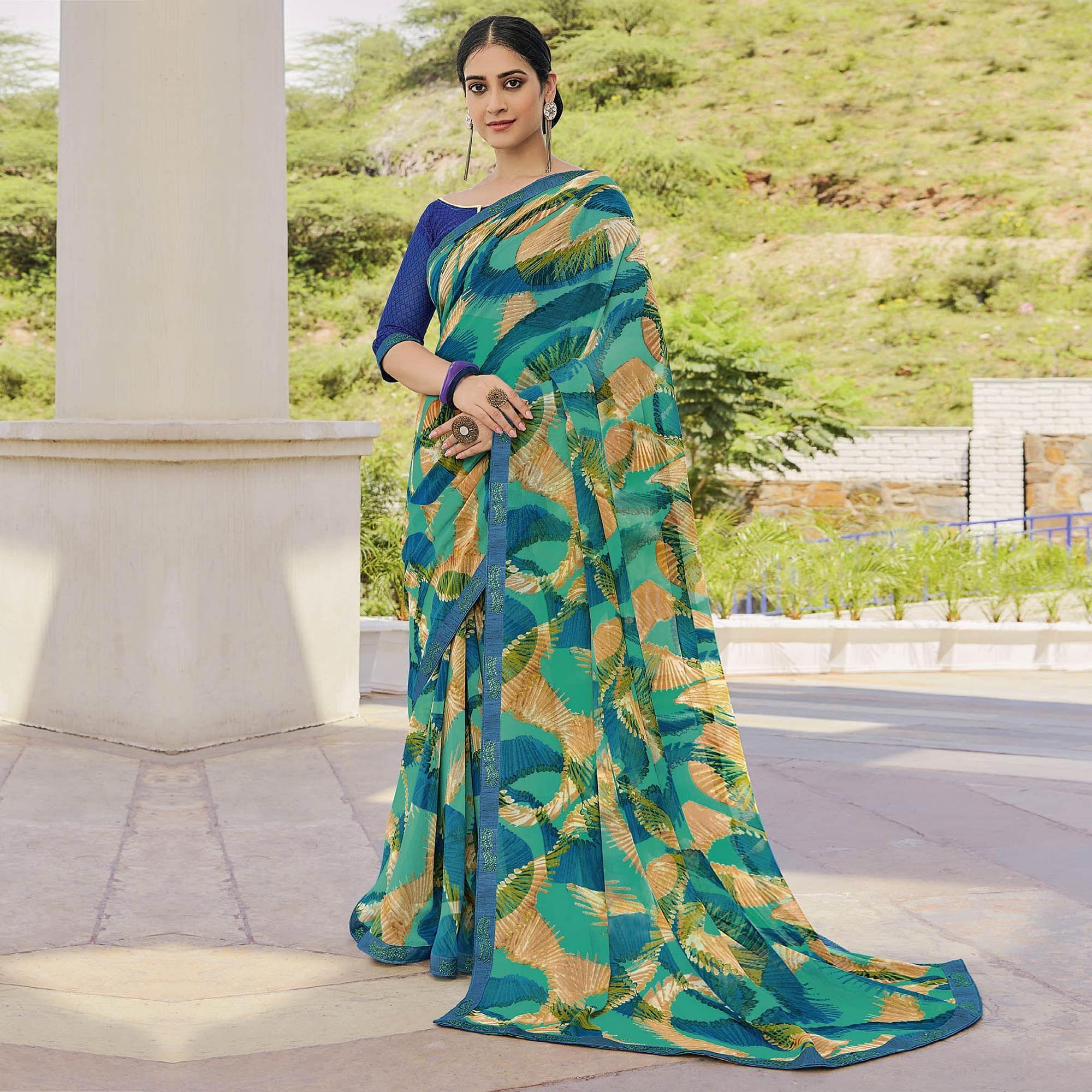Turquoise Partywear Printed Georgette Saree - Peachmode