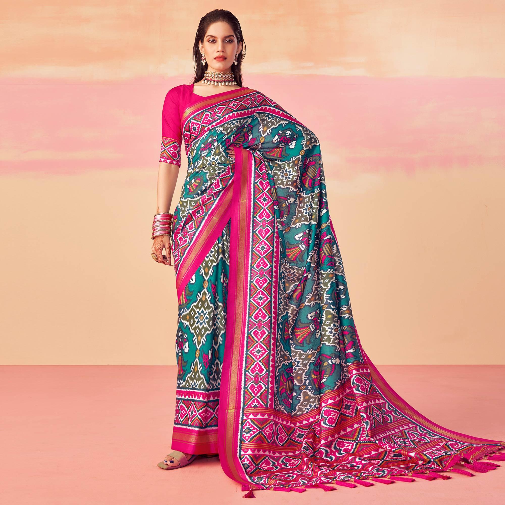 Turquoise Patola Printed Art Silk Saree With Tassels - Peachmode
