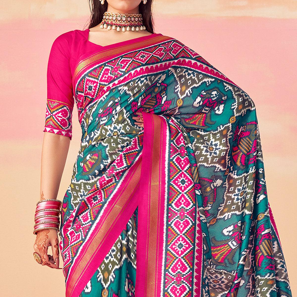 Turquoise Patola Printed Art Silk Saree With Tassels - Peachmode
