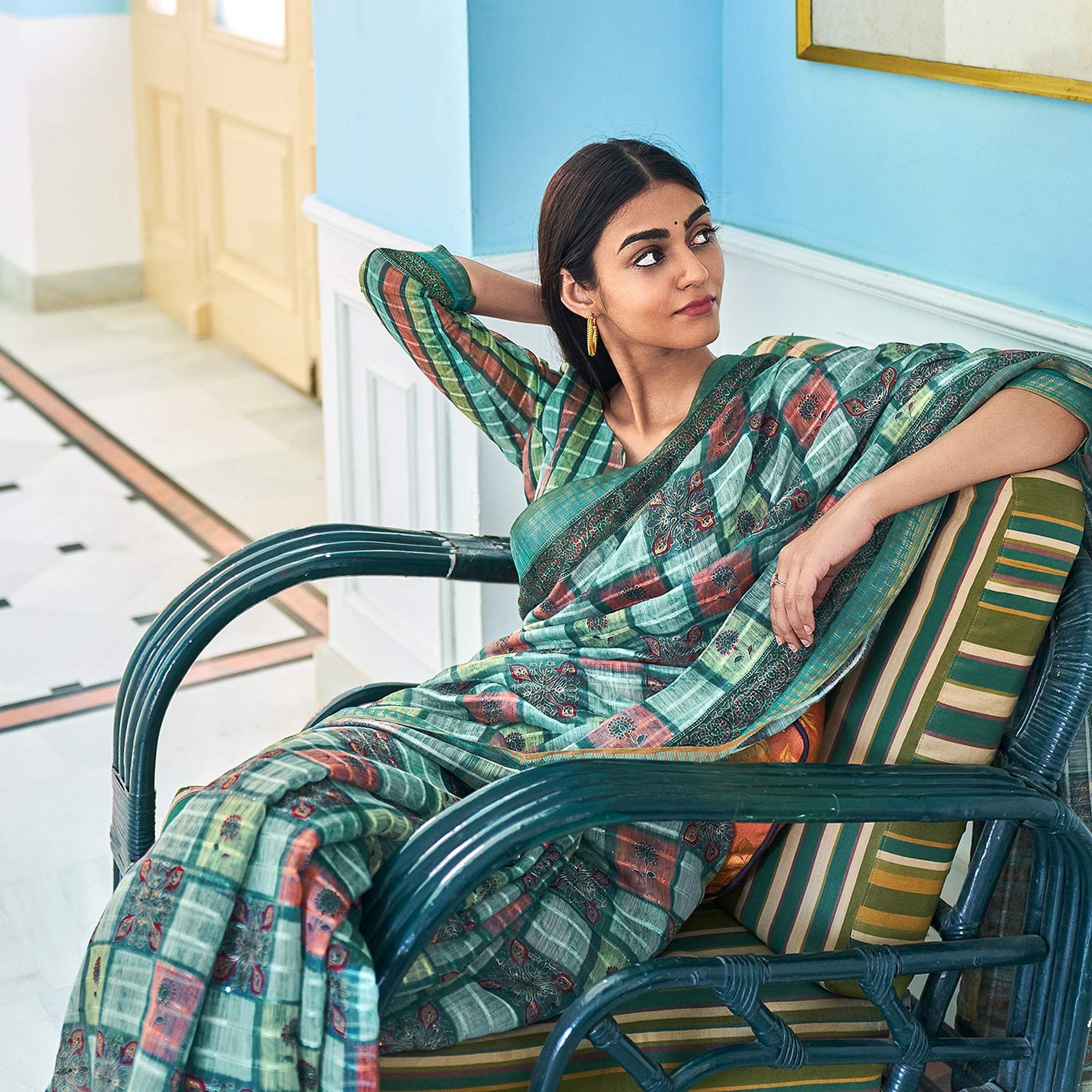 Turquoise Sequence Embroidered Linen Saree - Peachmode