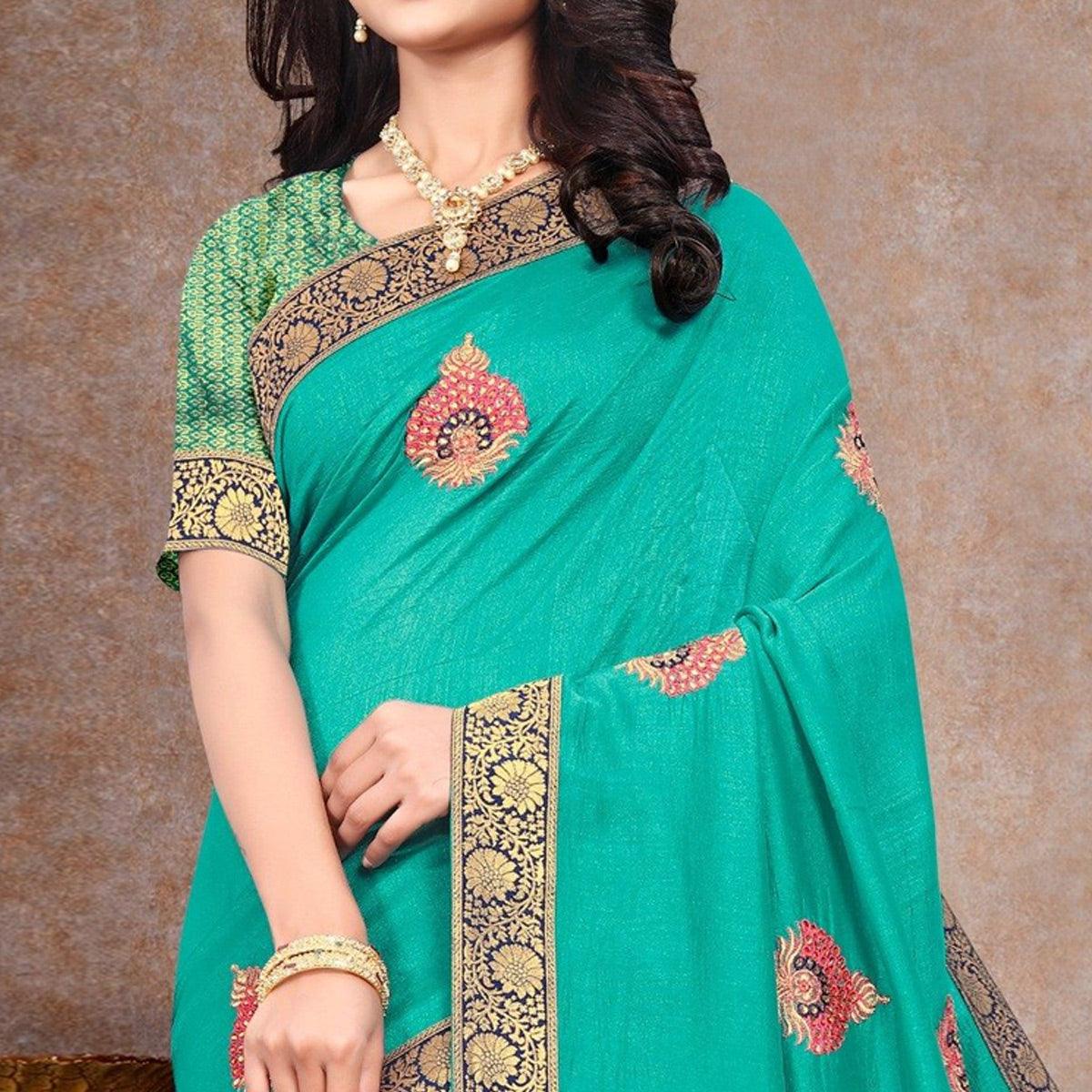 Turquoise Sequence Embroidered Vichitra Silk Saree - Peachmode