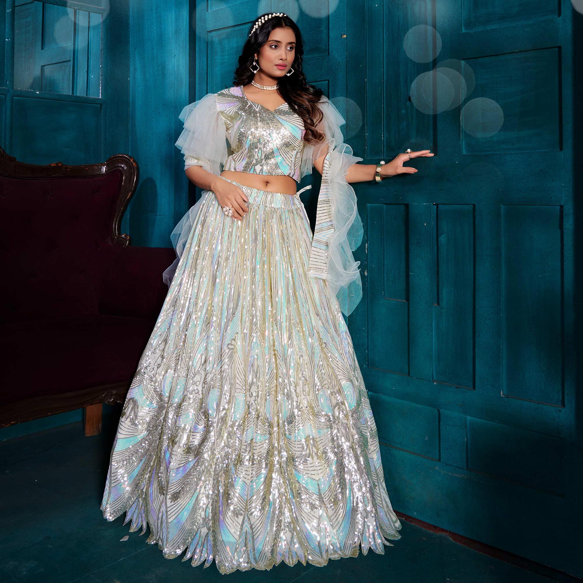 Turquoise Sequence Embroidered With Stonework Art Silk Lehenga Choli - Peachmode