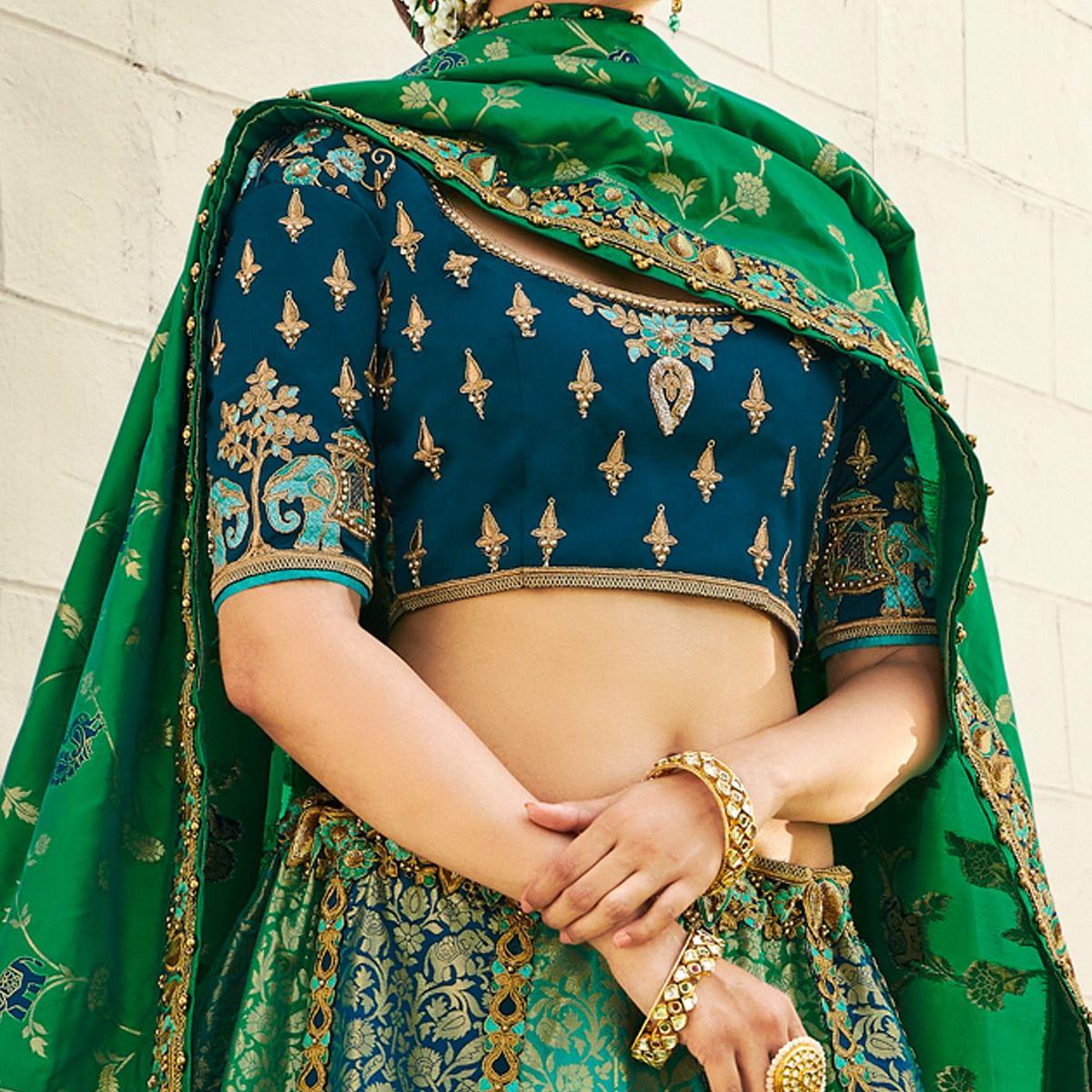 Turquoise Wedding Wear Heavy Embroidered Banarasi Silk Lehenga Choli - Peachmode