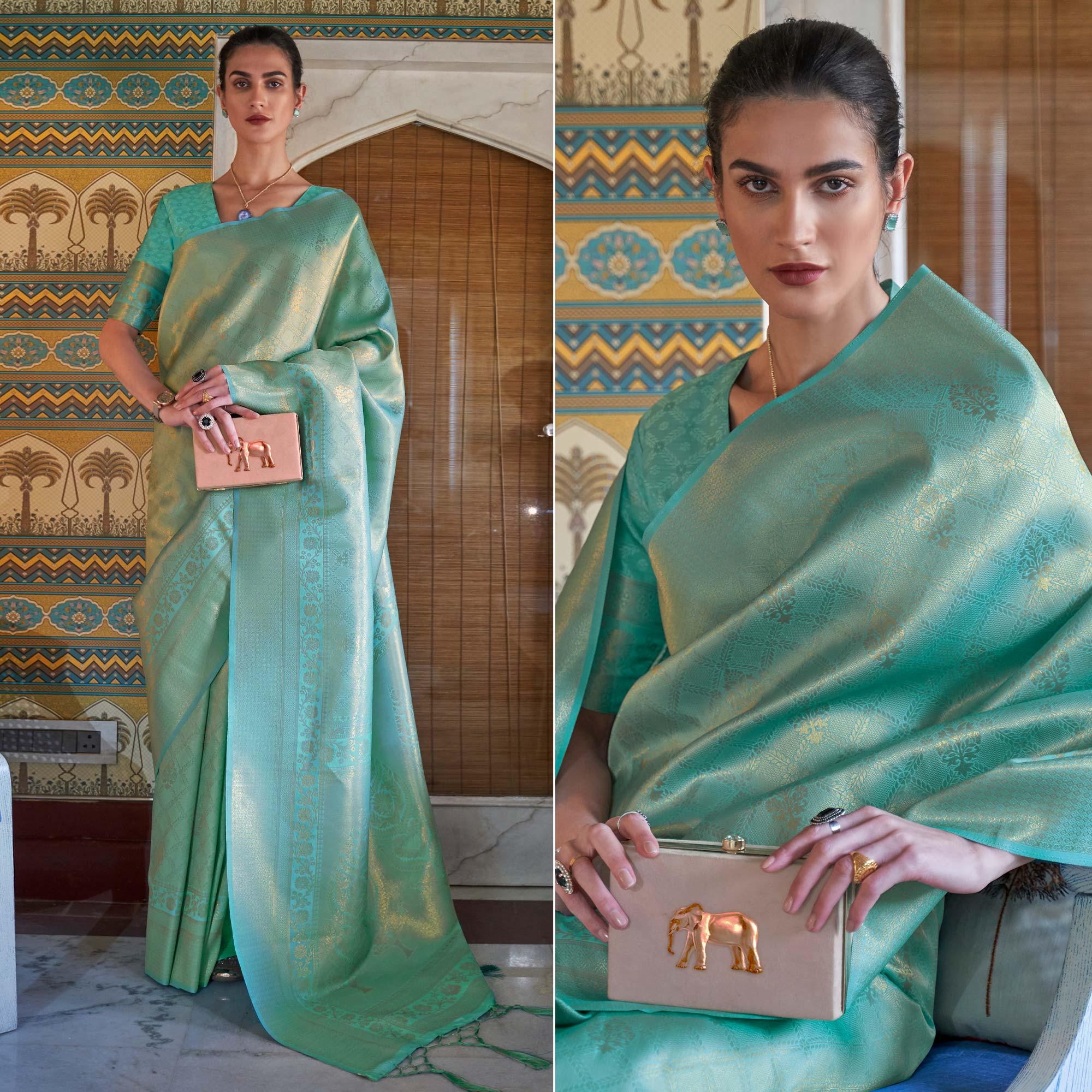 Turquoise Woven Art Silk Saree With Tassels - Peachmode