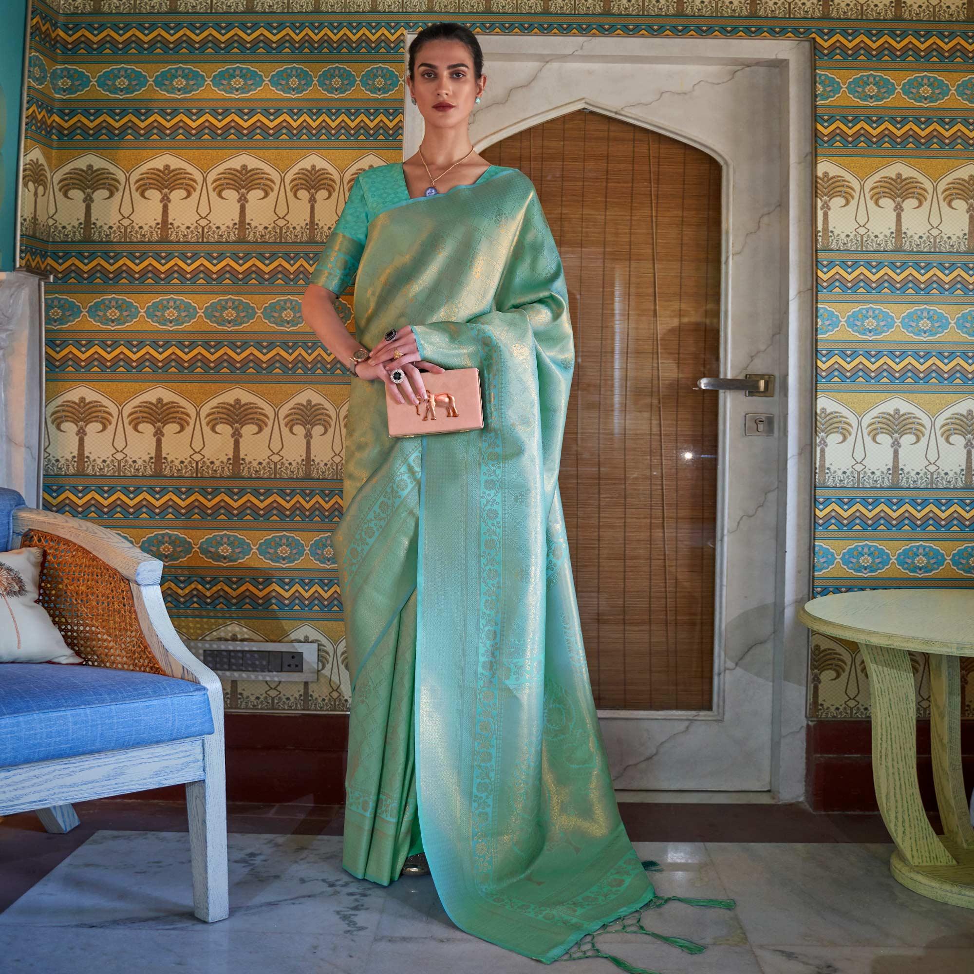 Turquoise Woven Art Silk Saree With Tassels - Peachmode
