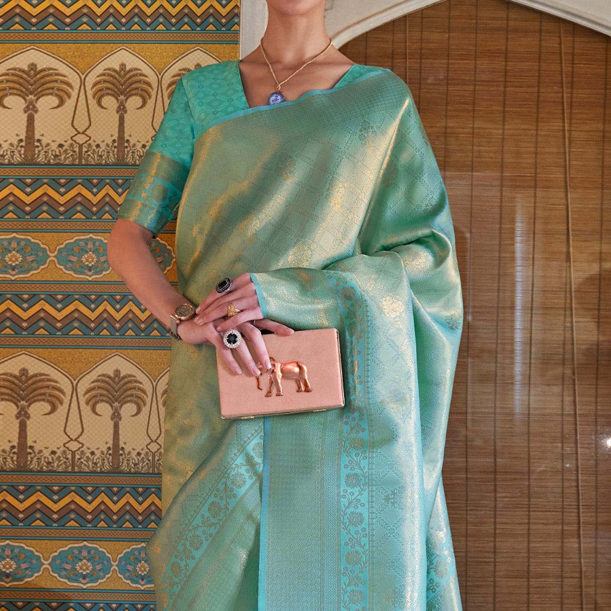 Turquoise Woven Art Silk Saree With Tassels - Peachmode