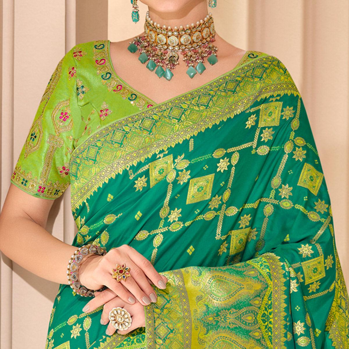 Turquoise Woven Banarasi Silk Saree With Tassels - Peachmode