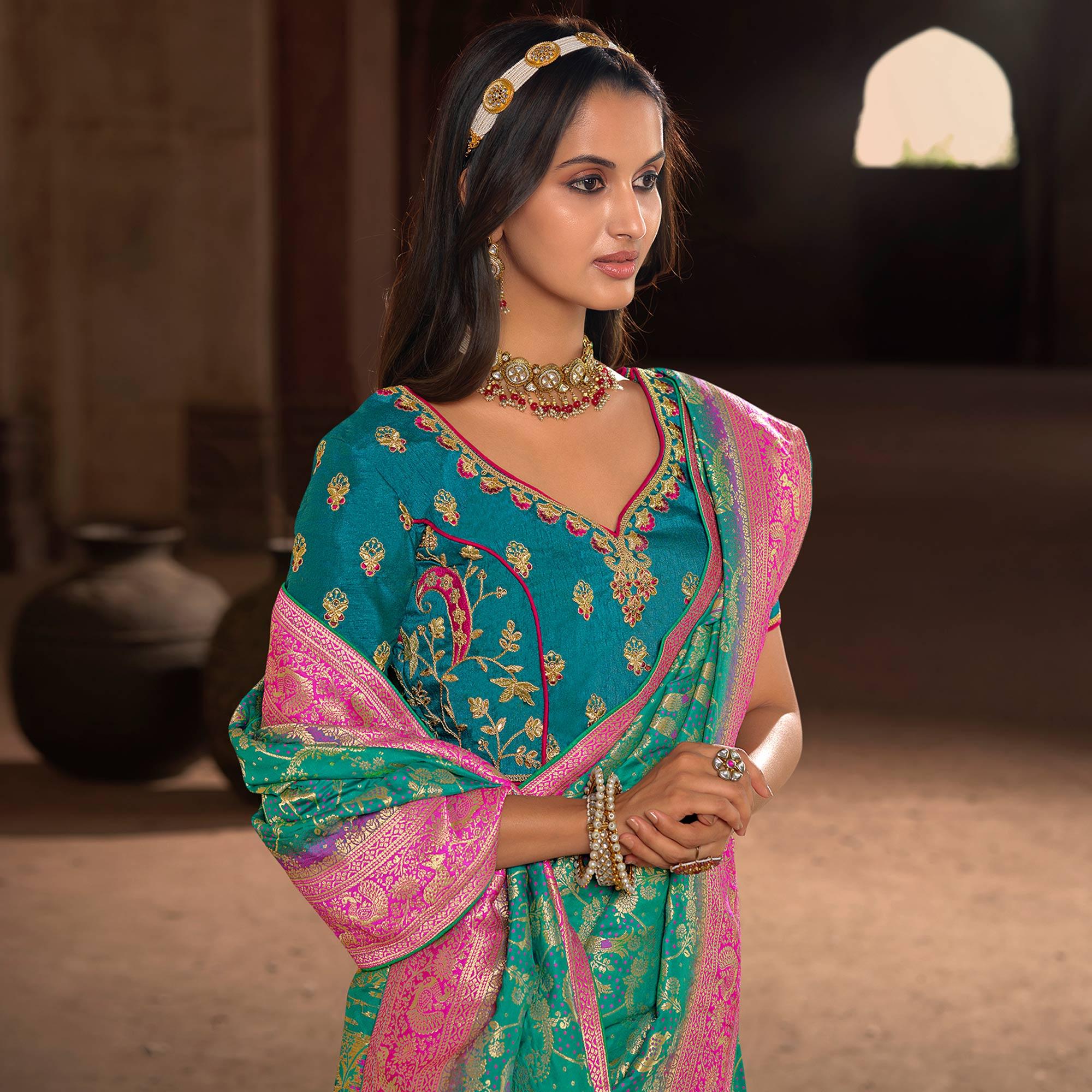 Turquoise Woven Banarasi Silk Saree With Tassels - Peachmode