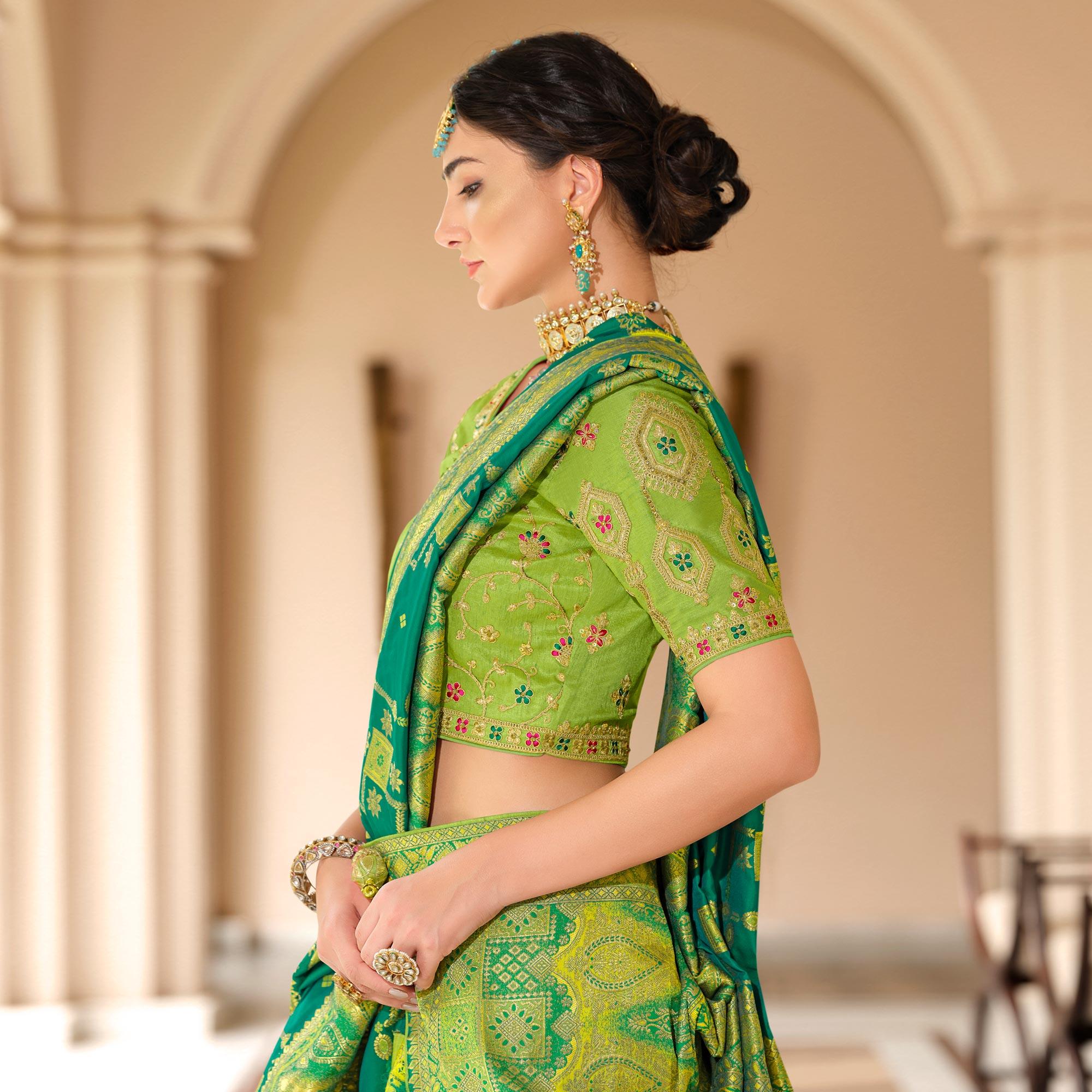 Turquoise Woven Banarasi Silk Saree With Tassels - Peachmode