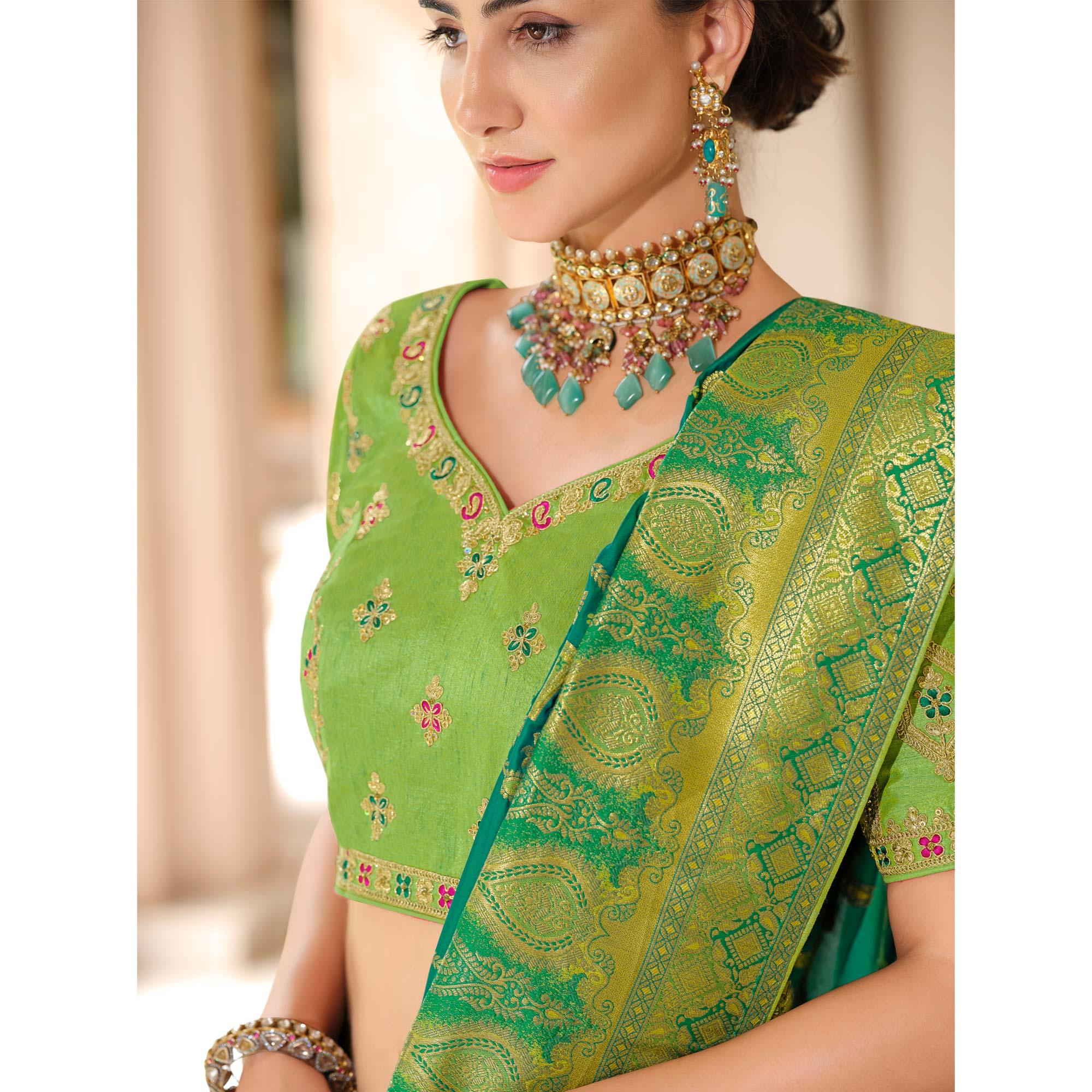 Turquoise Woven Banarasi Silk Saree With Tassels - Peachmode