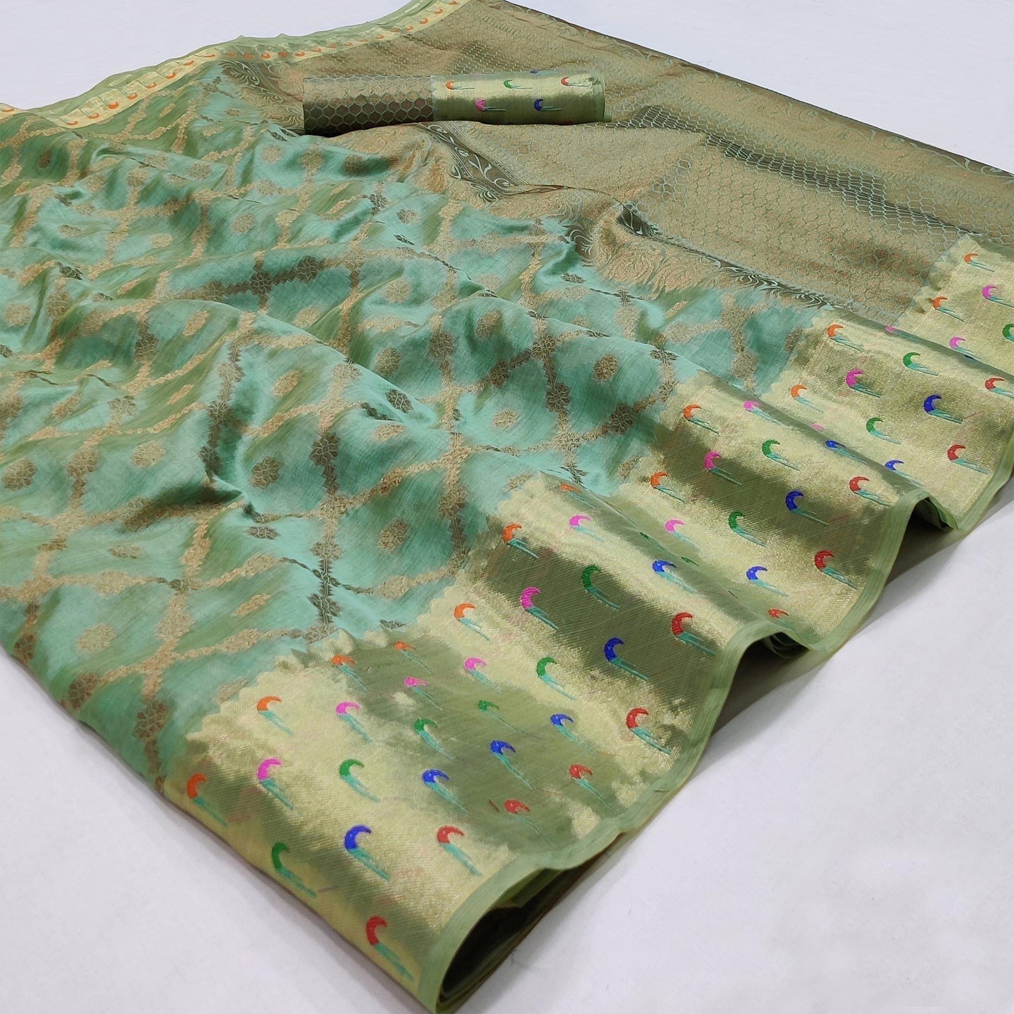 Turquoise Woven Organza Saree - Peachmode