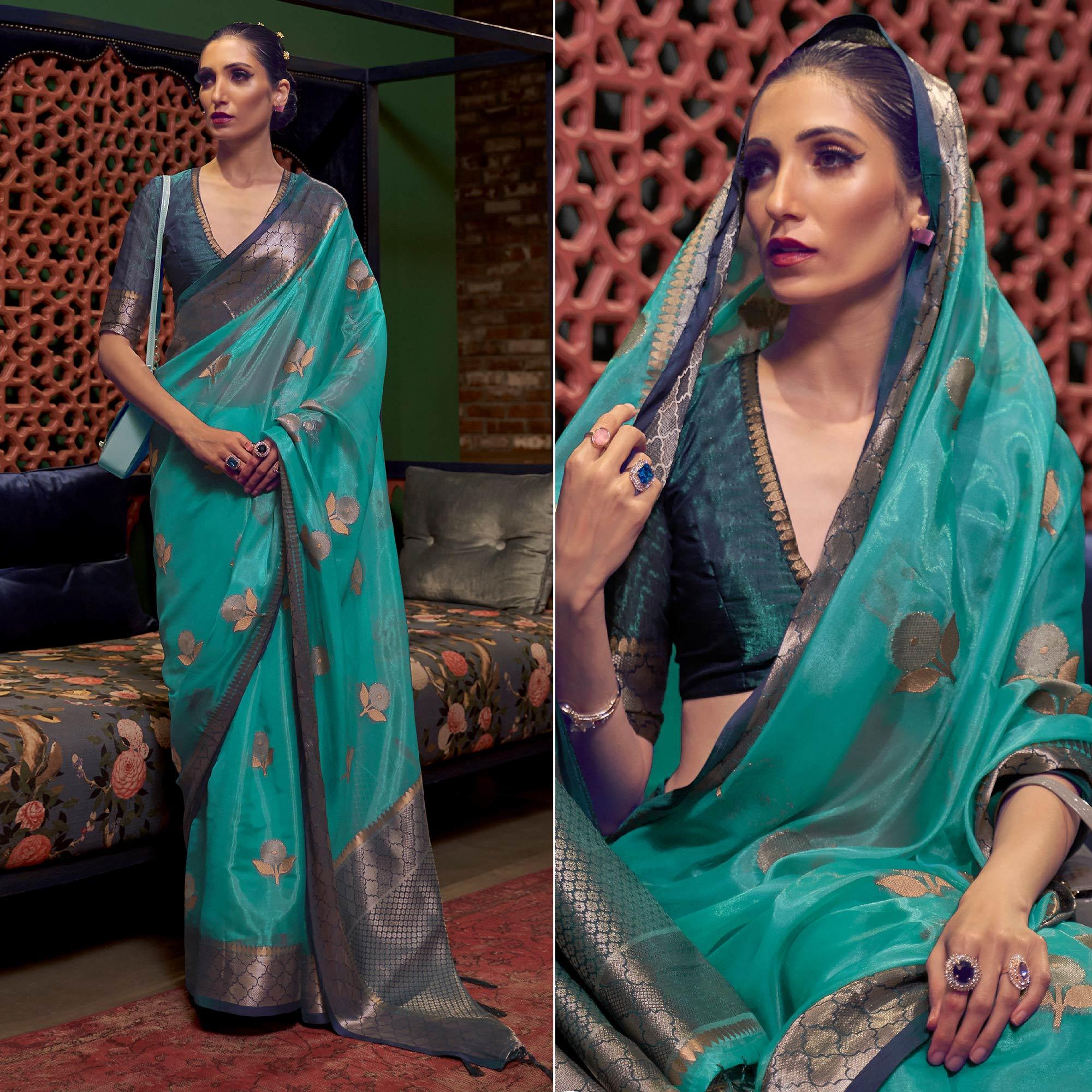 Turquoise Woven Organza Saree With Tassels - Peachmode