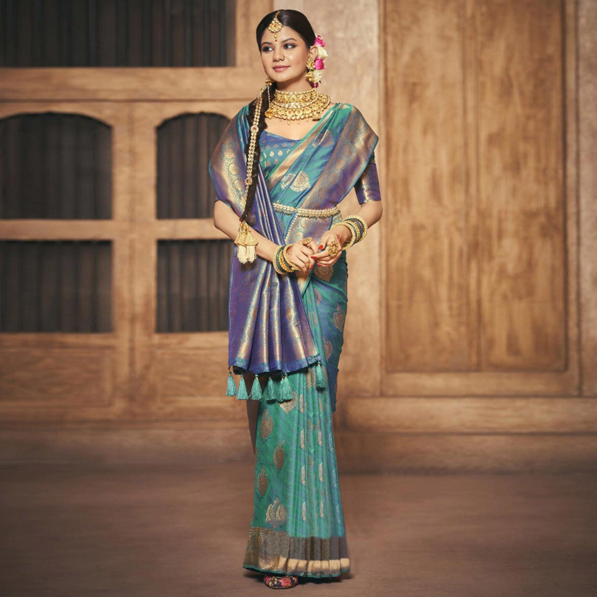 Turquoise Woven Silk Saree With Tassels - Peachmode