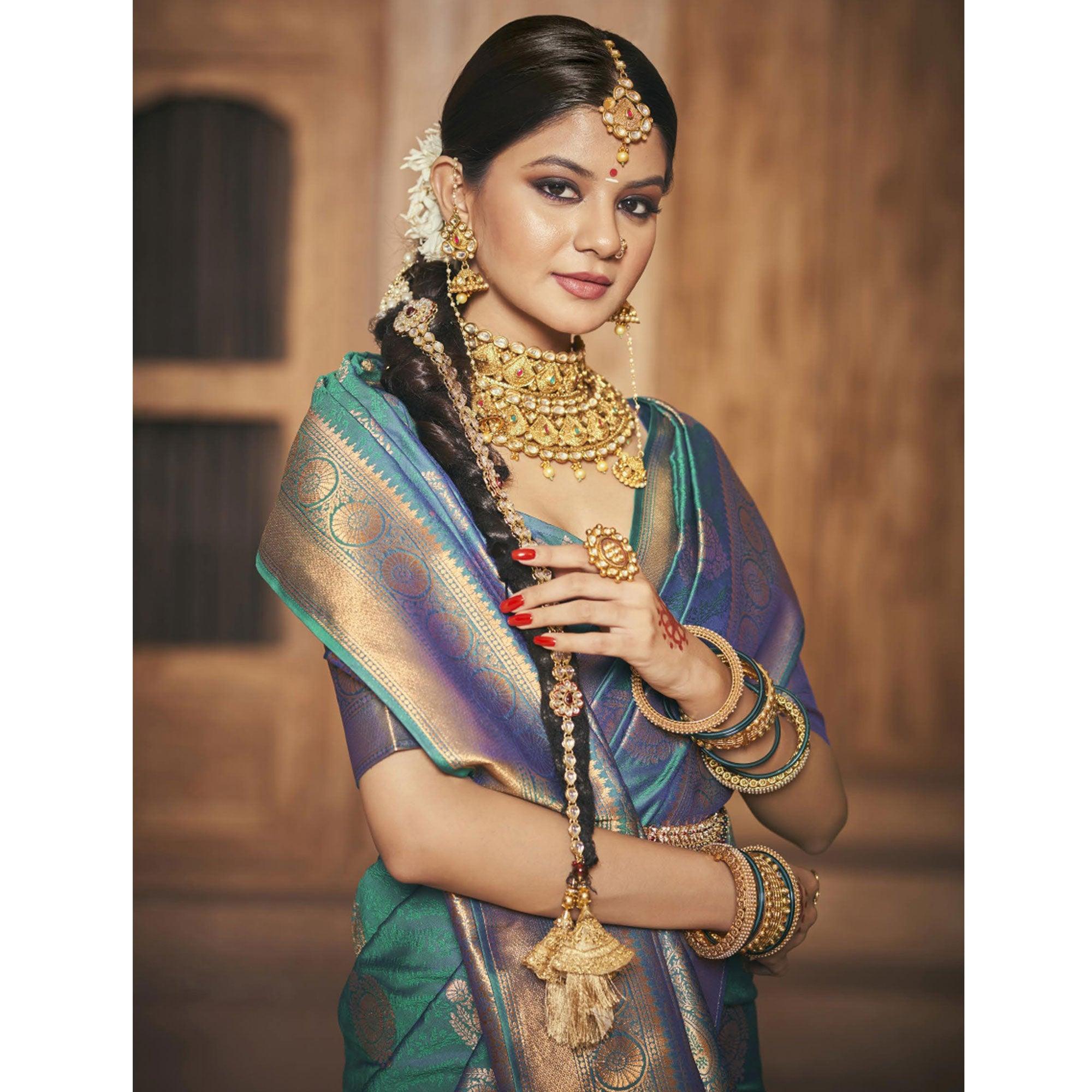 Turquoise Woven Silk Saree With Tassels - Peachmode