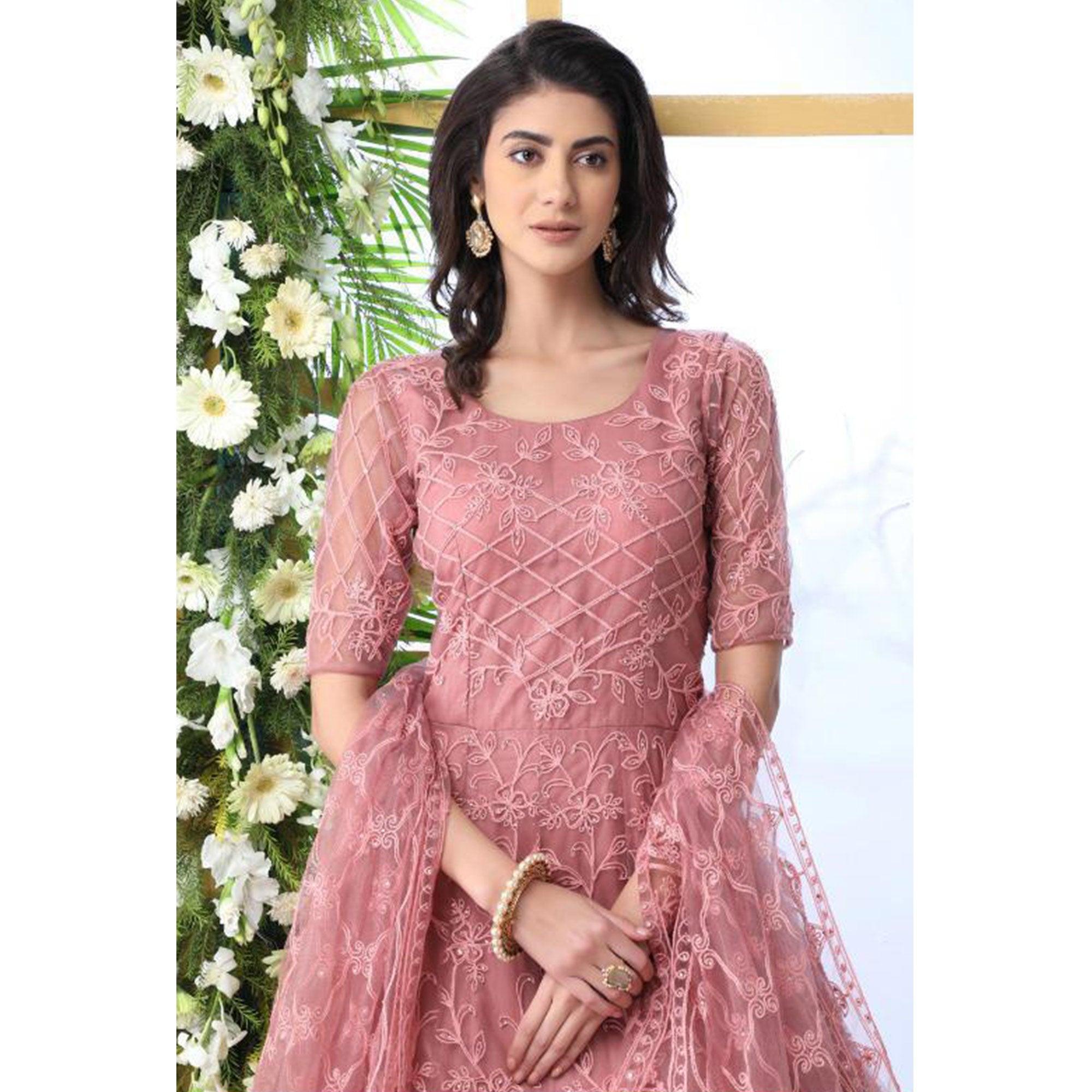 Unique Dusty Peach Colored Party Wear Embroidered Net Gown With Dupatta - Peachmode