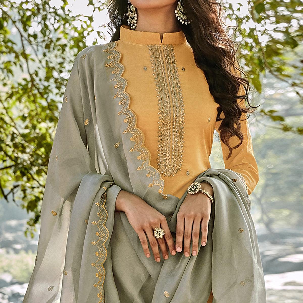 Unique Light Yellow Colored Partywear Embroidered Chanderi Suit - Peachmode