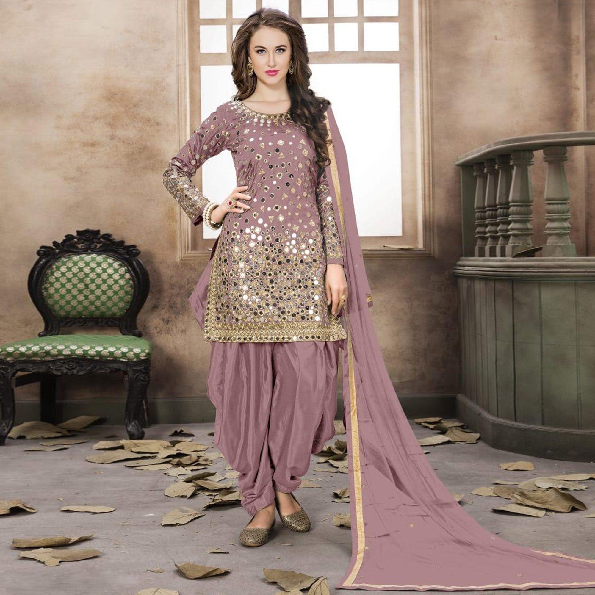Unique Mauve Colored Partywear Embroidered Tapeta Silk Patiala Suit - Peachmode
