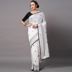 White - Black Casual Wear Embroidered Linen Saree With Tassels - Peachmode