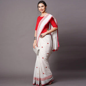 White - Red Casual Wear Embroidered Linen Saree With Tassels - Peachmode