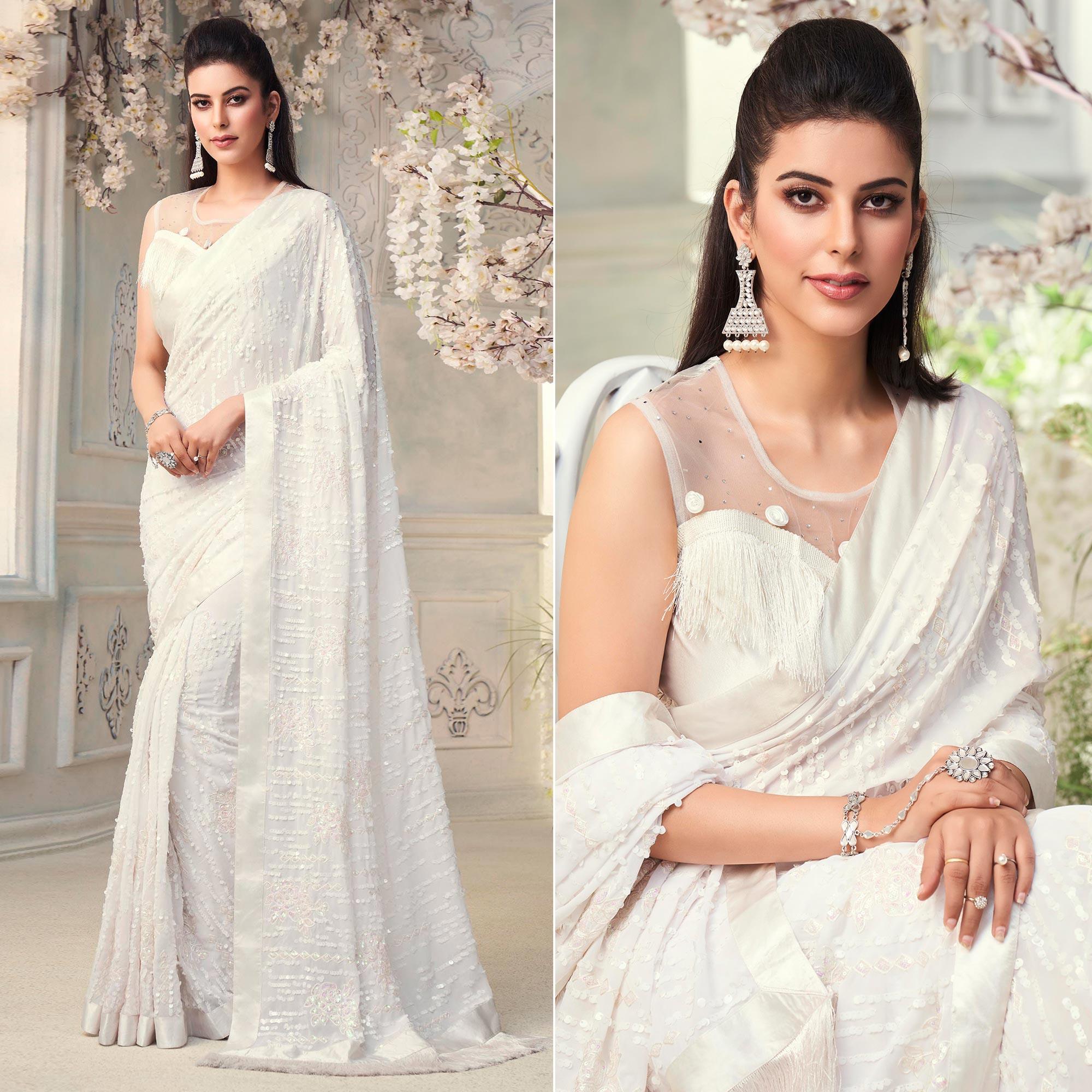 White Sequence Embroidered Georgette Saree With Tassels - Peachmode