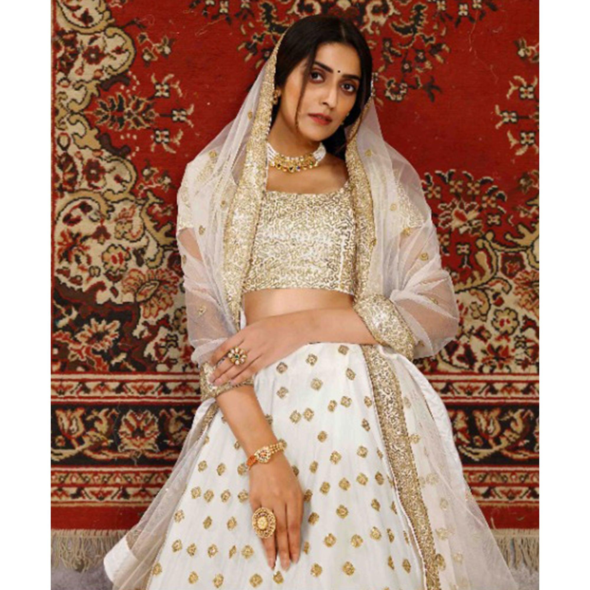 White Wedding Wear Sequence Embroidered Net Lehenga Choli - Peachmode