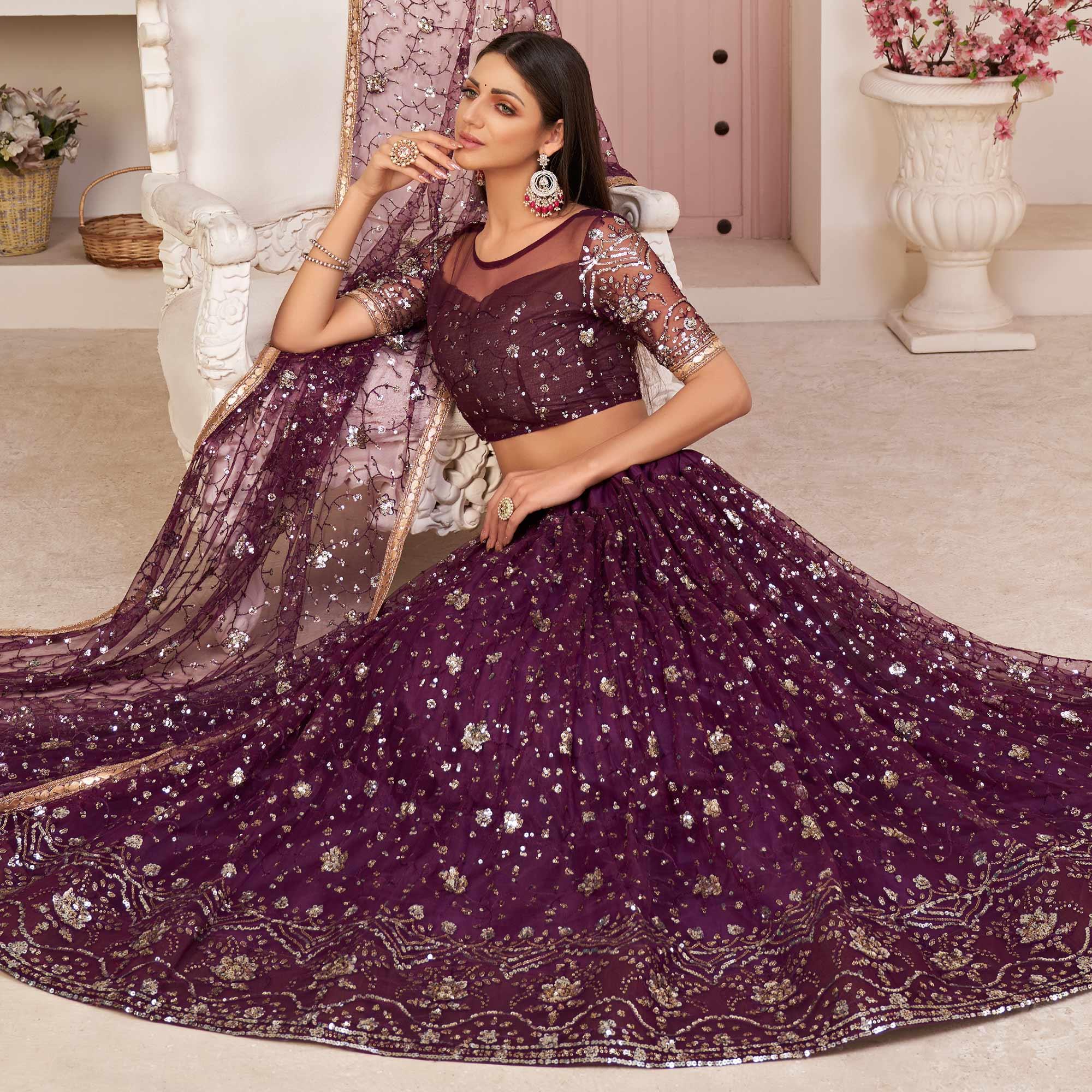 Wine Sequence Embroidered Netted Lehenga Choli - Peachmode