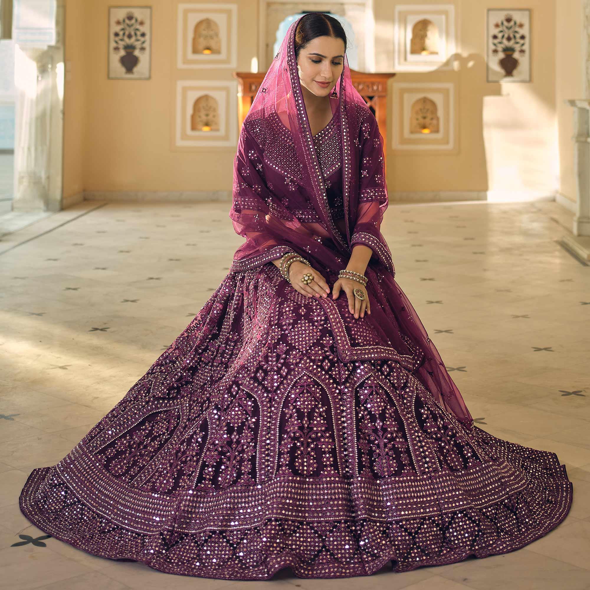 Wine Wedding Wear Embellished Netted Lehenga Choli - Peachmode