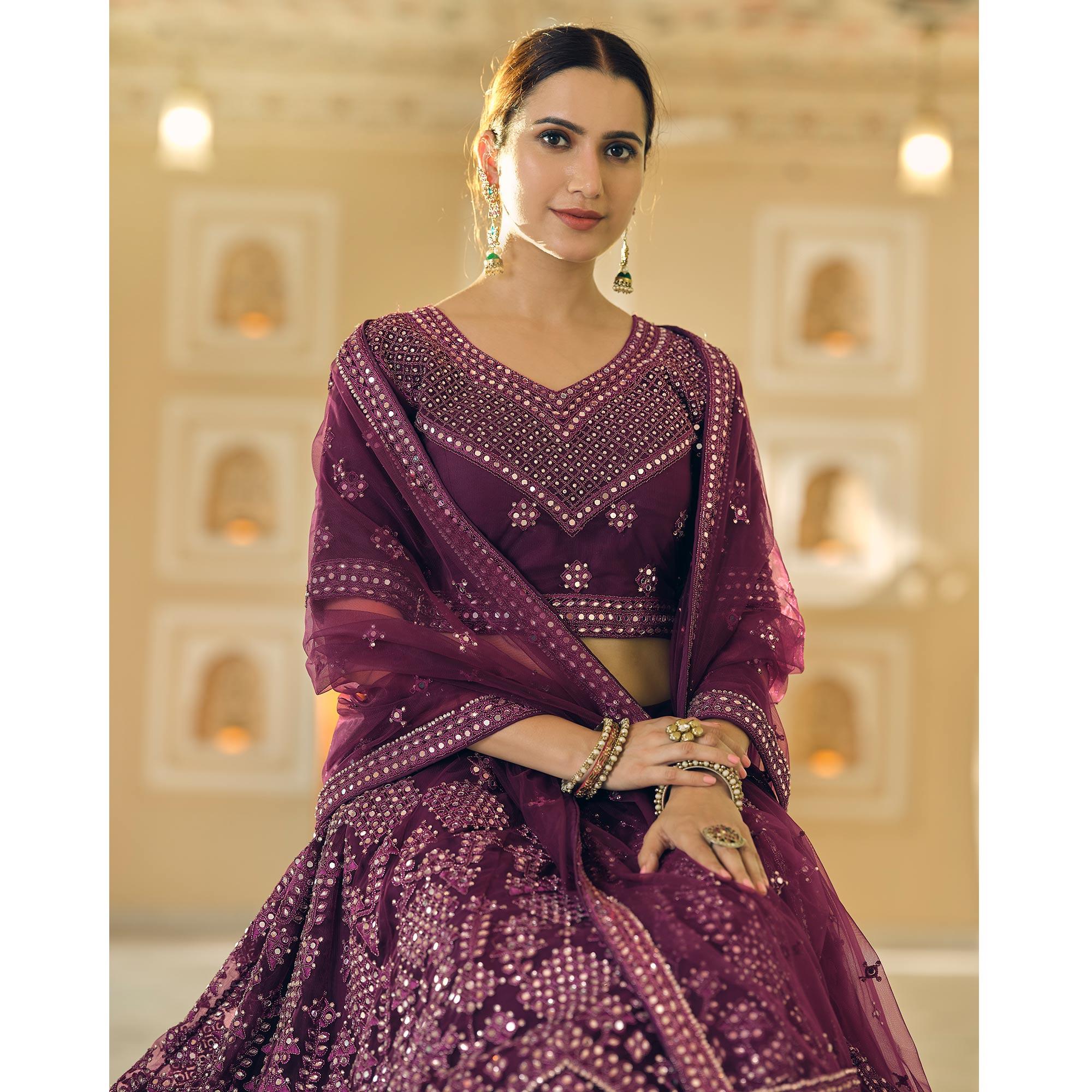 Wine Wedding Wear Embellished Netted Lehenga Choli - Peachmode
