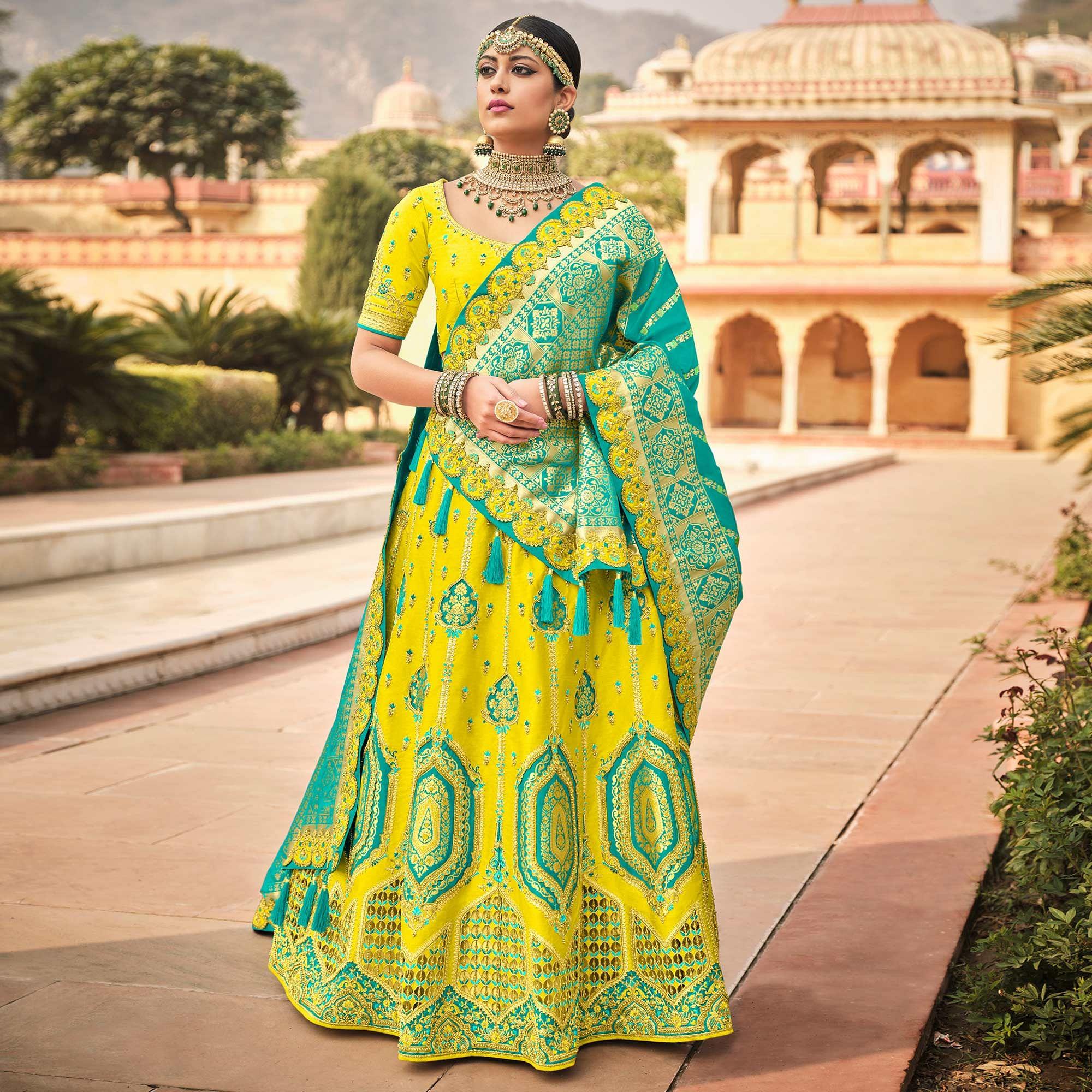 Yellow & Firozi Wedding Wear Woven-Embellished Banarasi Silk Lehenga Choli - Peachmode