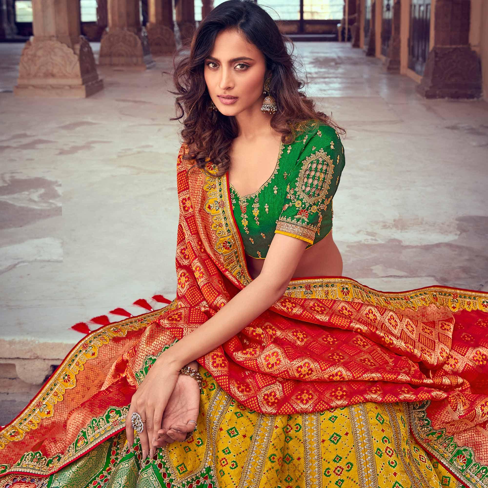 Yellow & Red Wedding Wear Woven & Embroidered Silk Lehenga Choli - Peachmode