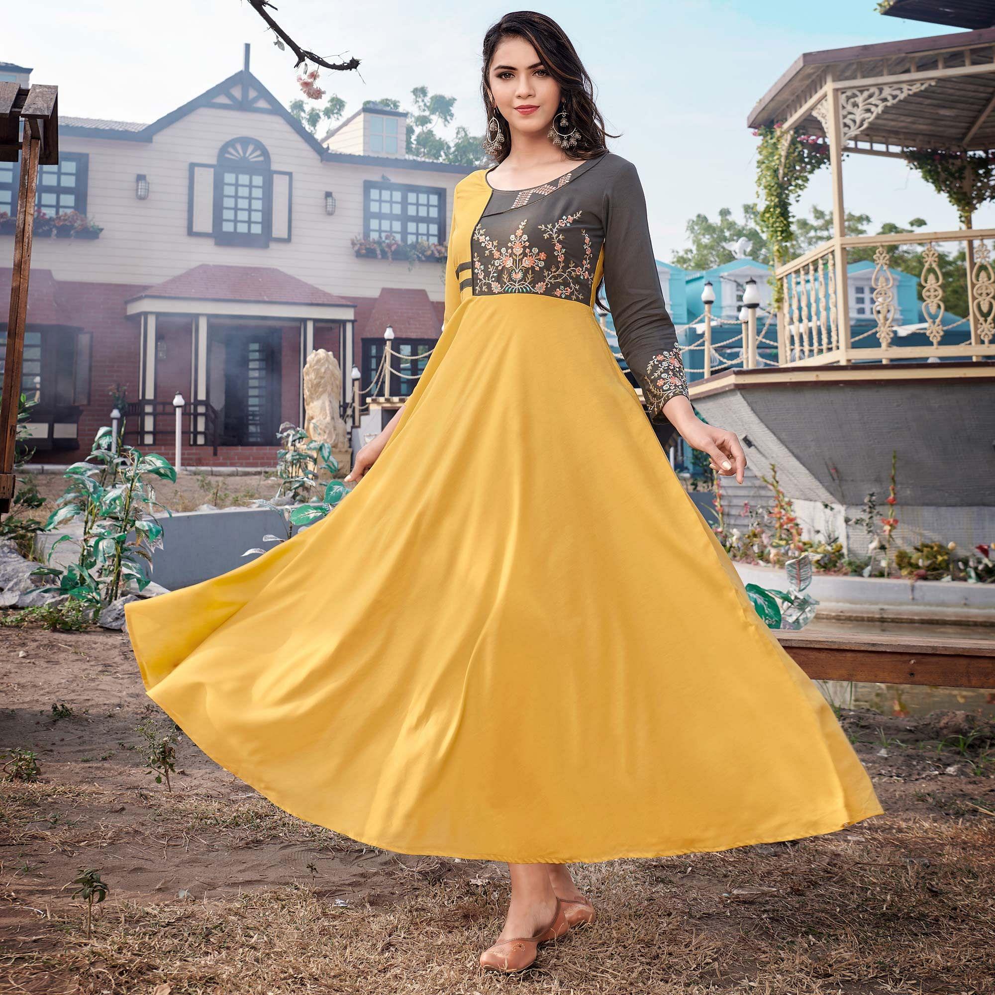 Yellow Casual Wear Embroidered Rayon Gown - Peachmode
