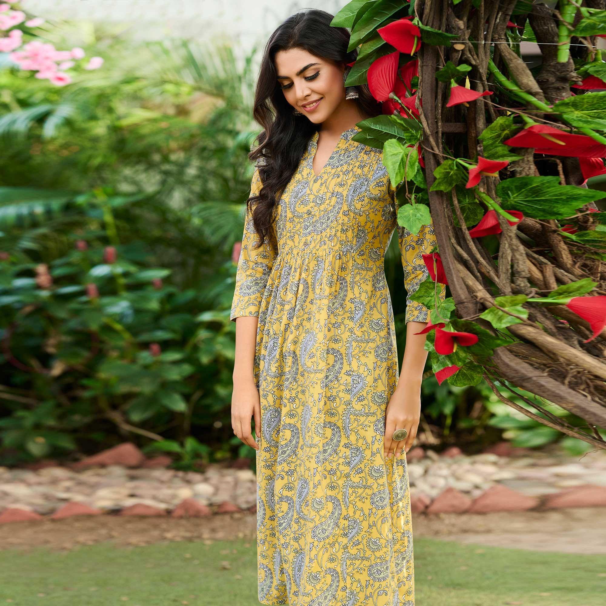 Yellow Casual Wear Floral Printed Pure Cotton Kurti - Peachmode
