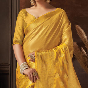 Yellow Festive Wear Solid Organza Saree With Tassels - Peachmode
