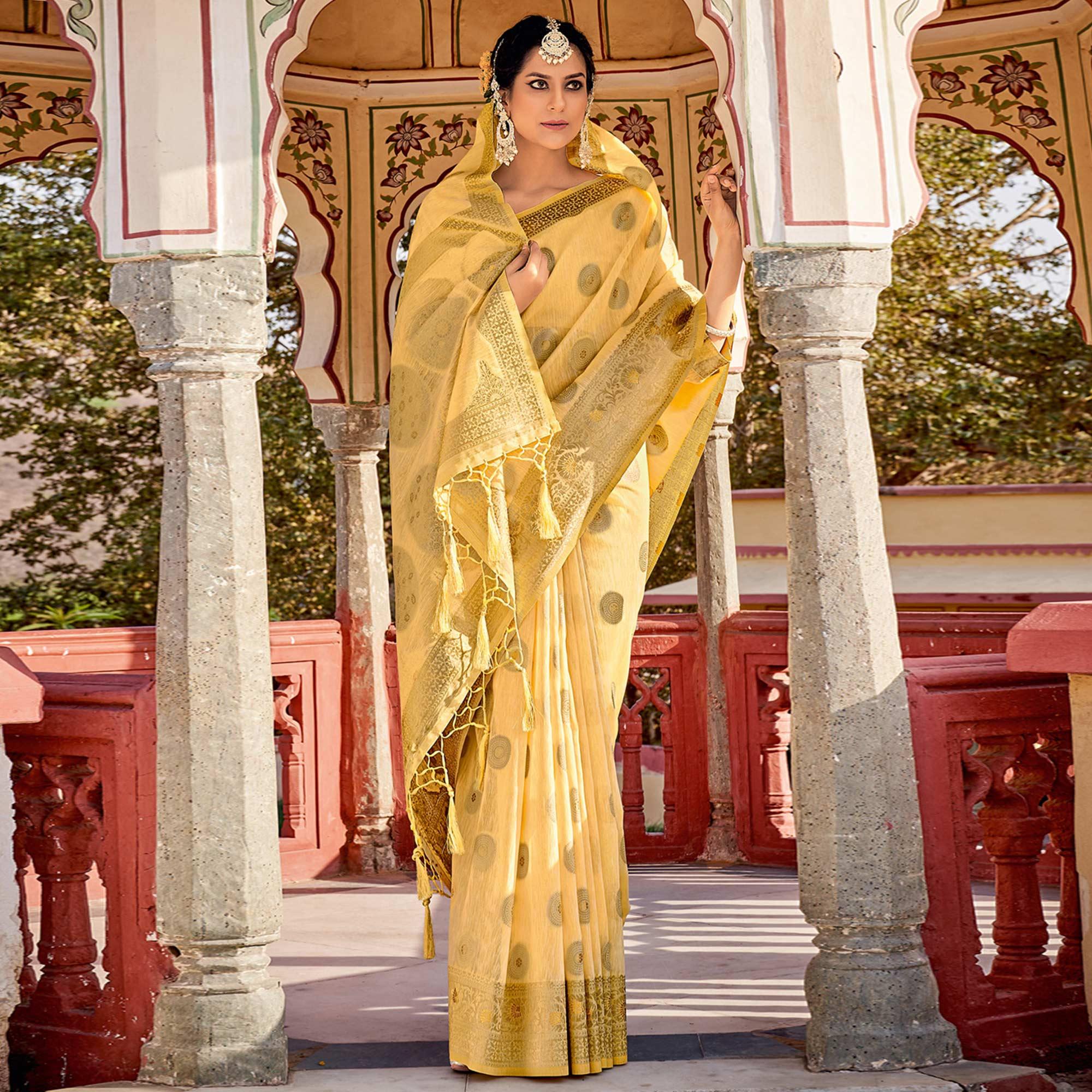Yellow Festive Wear Weaving Work Linen Saree With Tassels - Peachmode