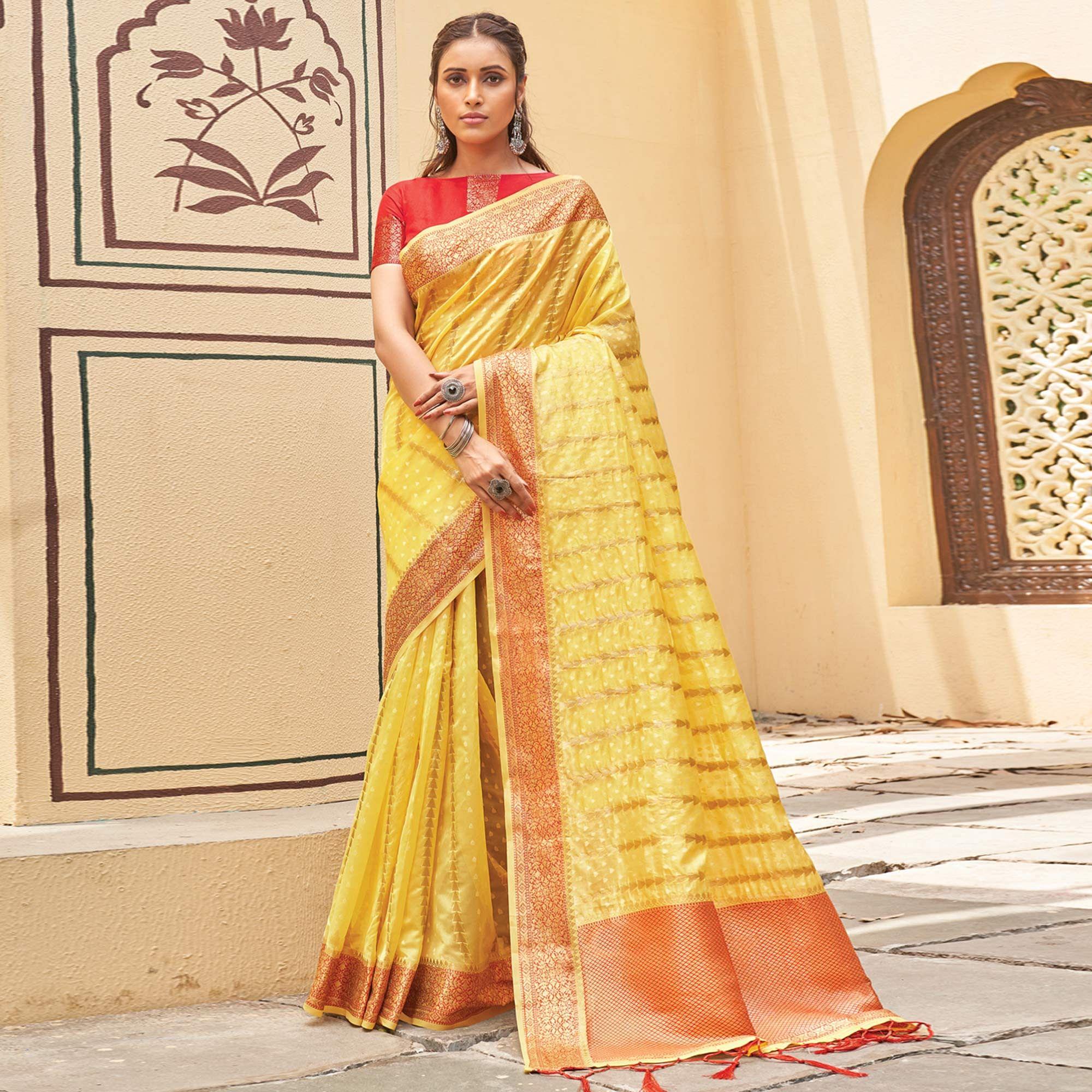 Yellow Festive Wear Woven Organza Saree With Tassels - Peachmode