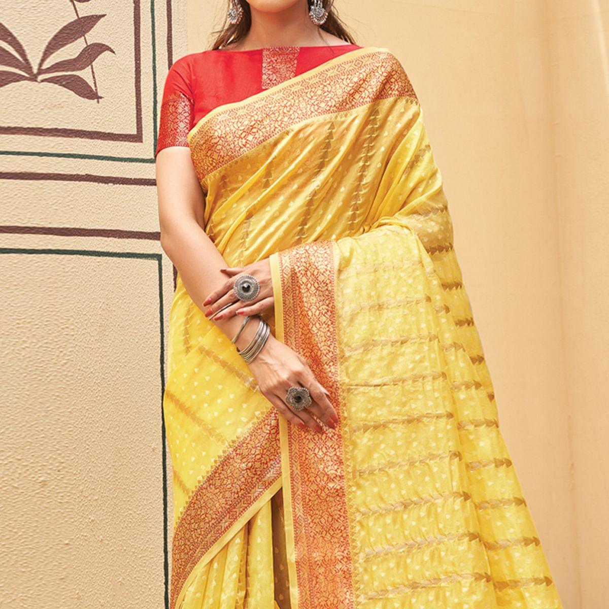 Yellow Festive Wear Woven Organza Saree With Tassels - Peachmode