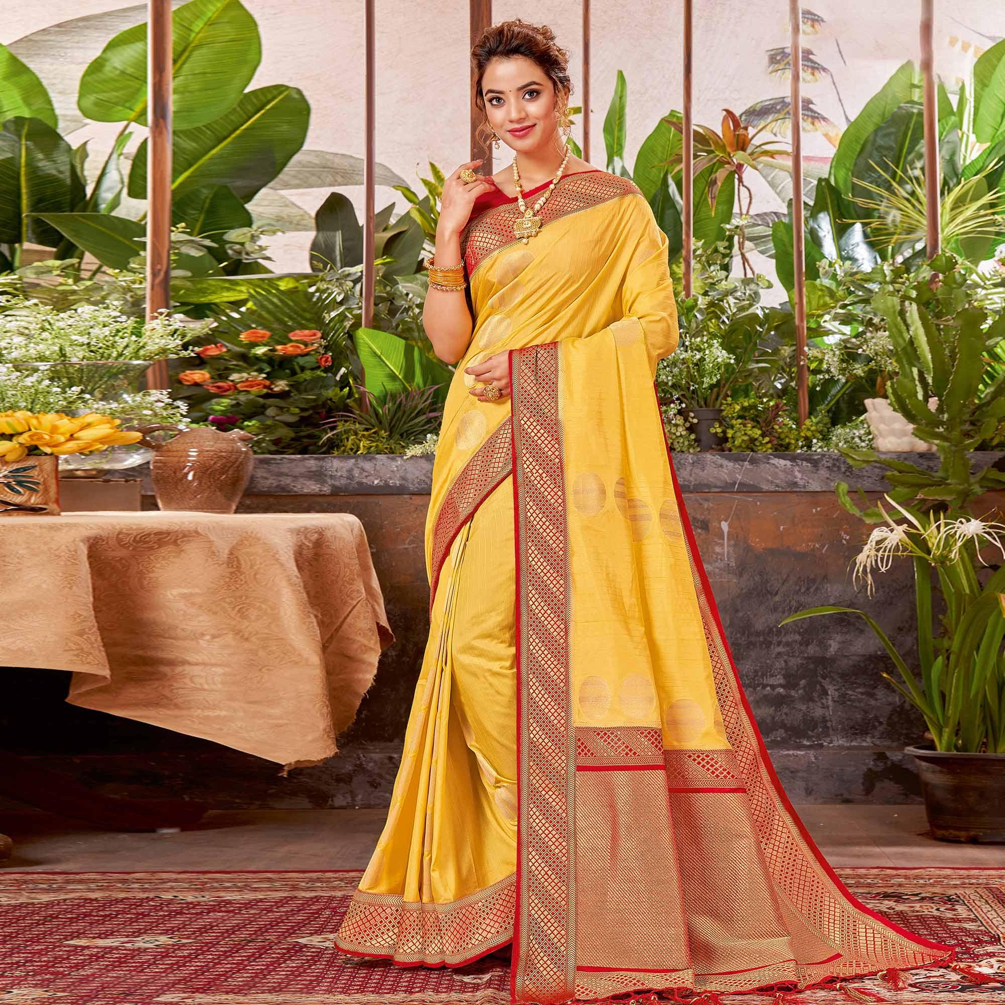 Yellow Festive Wear Woven Silk Saree With Tassels - Peachmode
