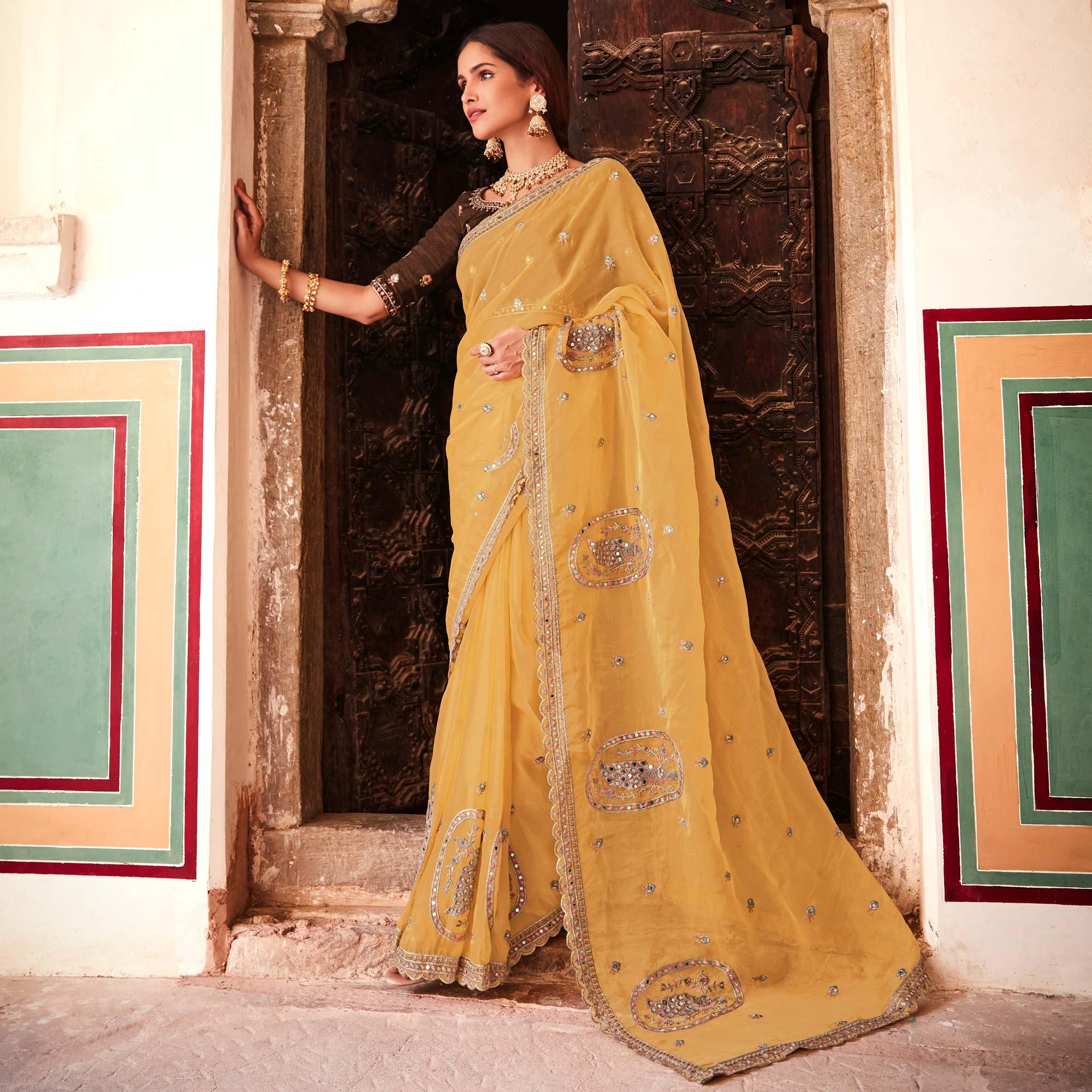 Yellow Partywear Embellished & Zari Organza Saree - Peachmode