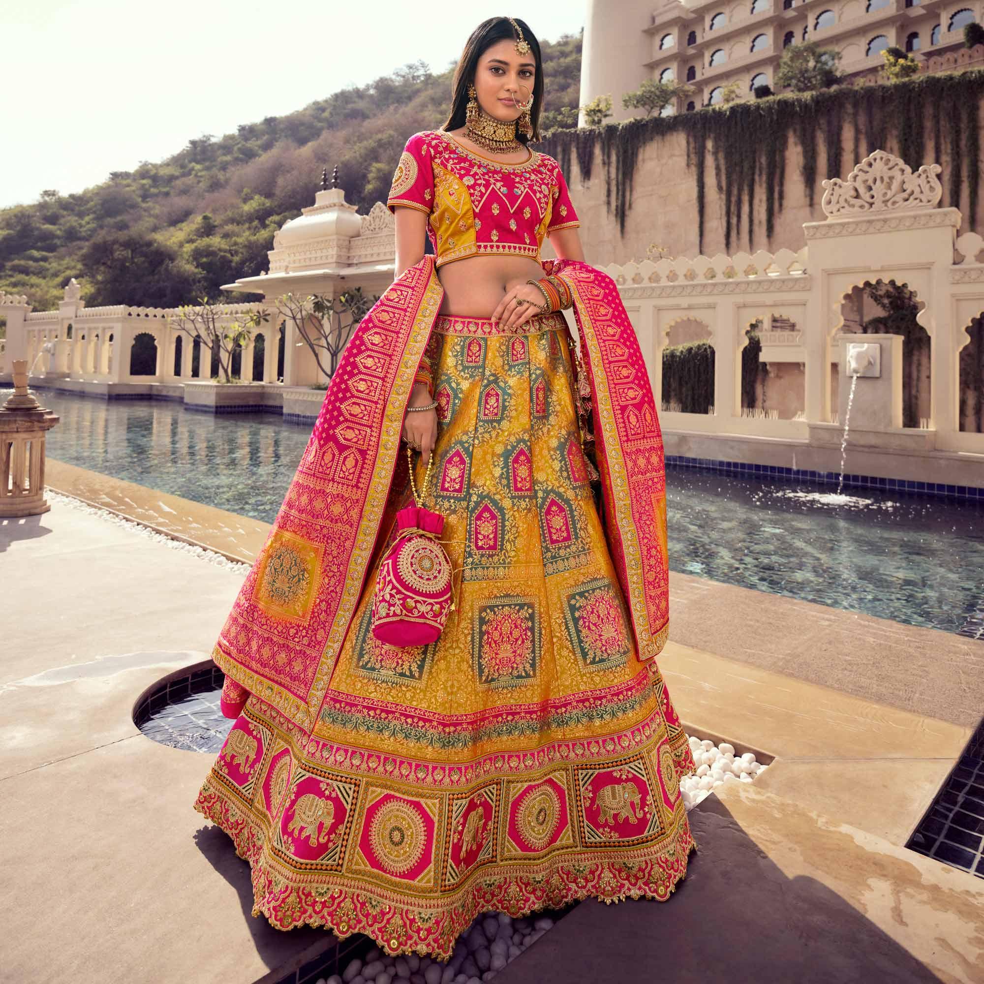 Yellow Partywear Embellished Embroidered Banarasi Silk Lehenga - Peachmode