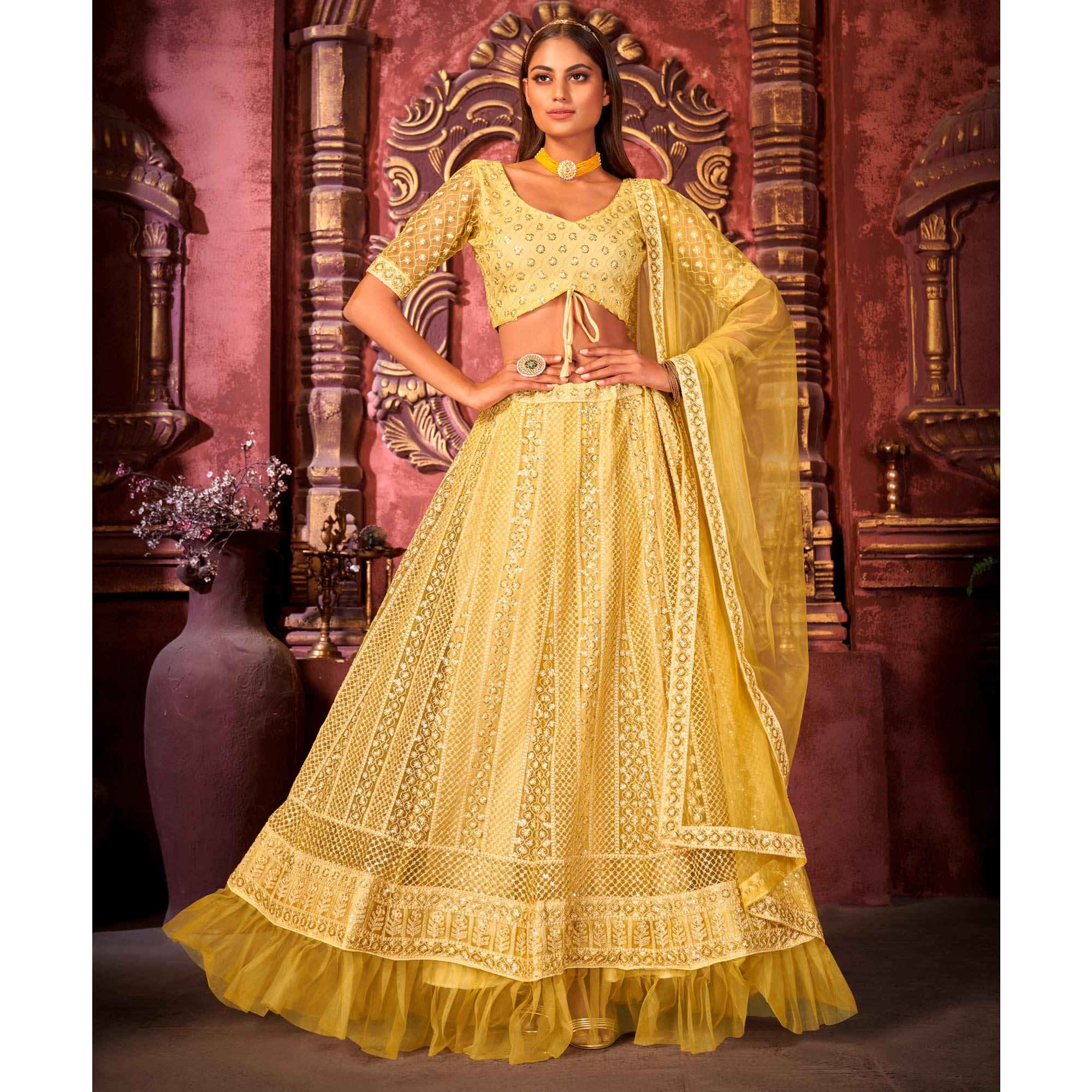 Yellow Partywear Embroidered Net Lehenga Choli - Peachmode