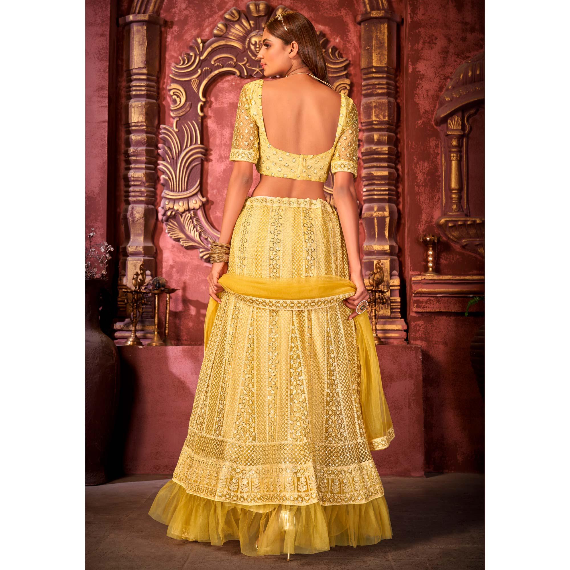 Yellow Partywear Embroidered Net Lehenga Choli - Peachmode