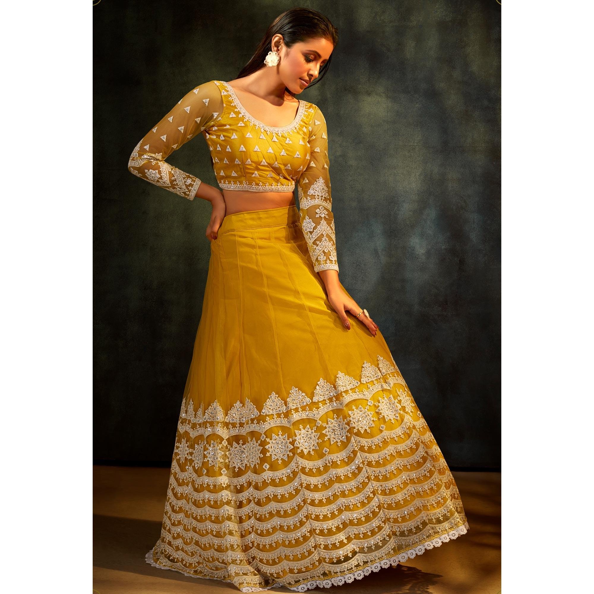 Yellow Partywear Sequence Embroidered Net Lehenga Choli - Peachmode