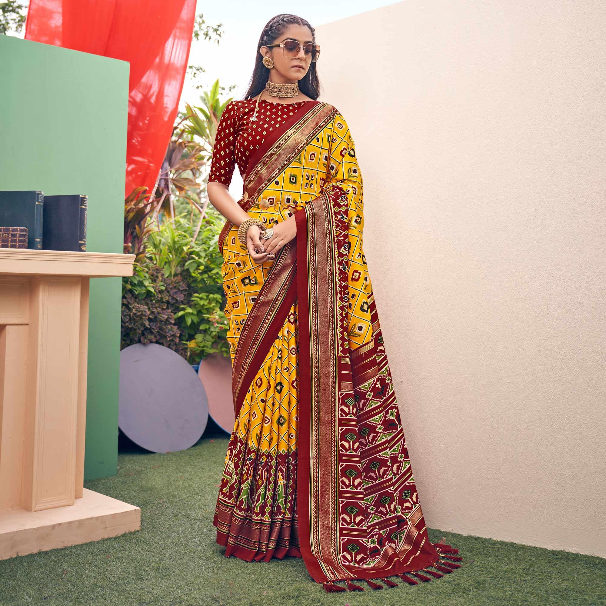 Yellow Patola Printed Silk Saree With Tassels - Peachmode