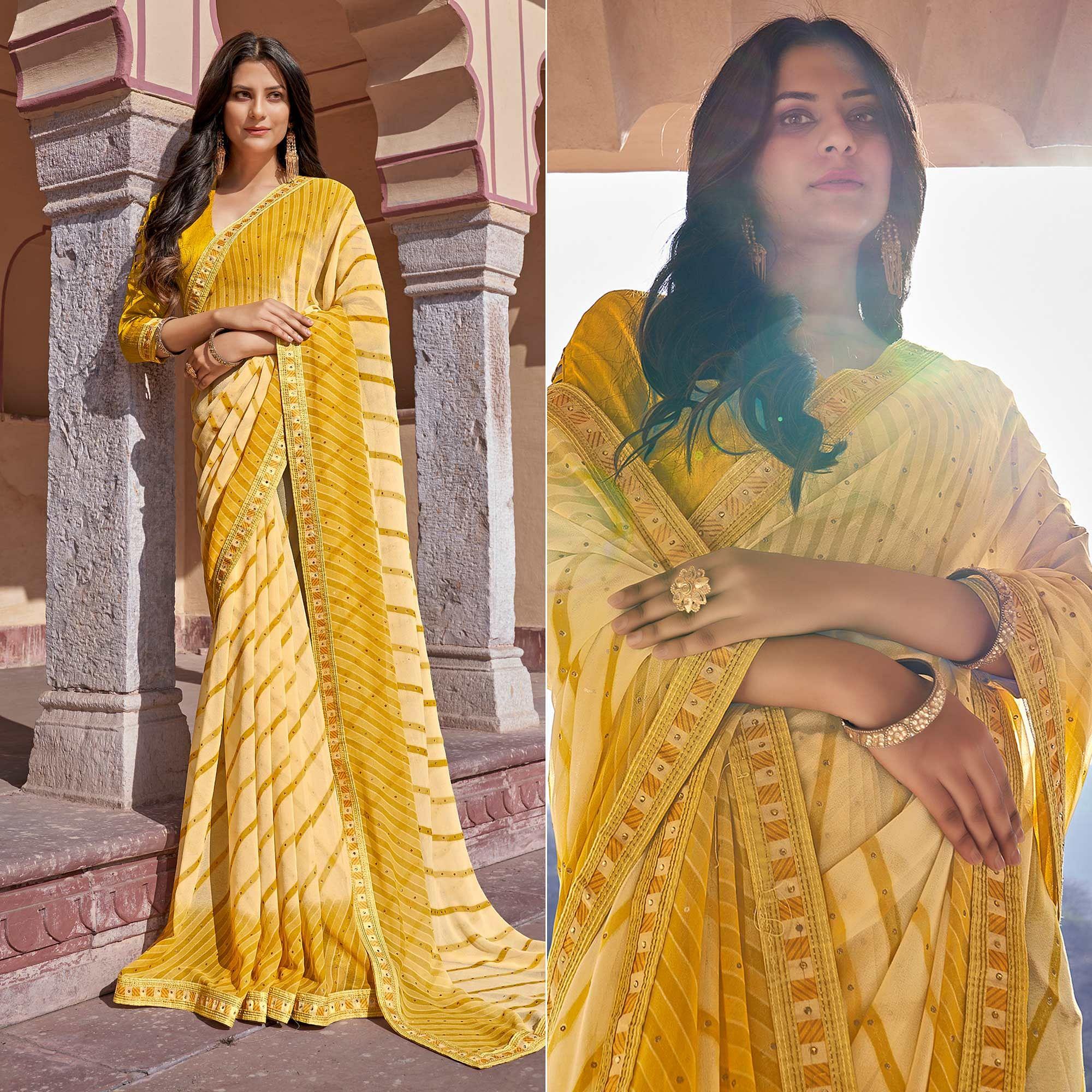 Yellow Printed With Embellished Georgette Saree - Peachmode