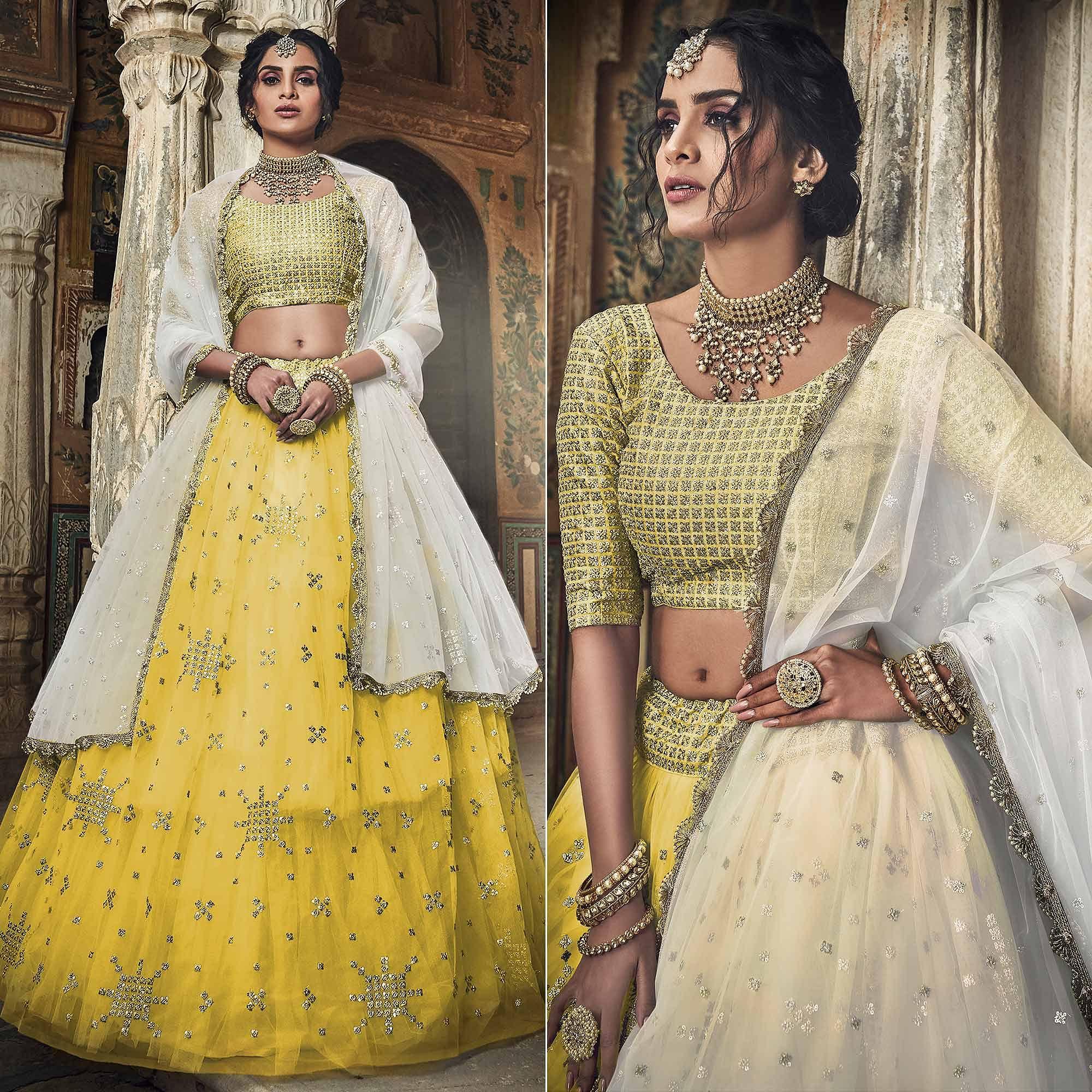 Yellow Sequence Embroidered Net Lehenga Choli - Peachmode