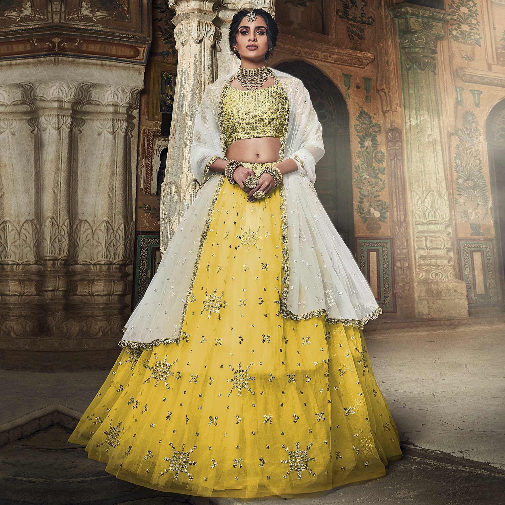 Yellow Sequence Embroidered Net Lehenga Choli - Peachmode