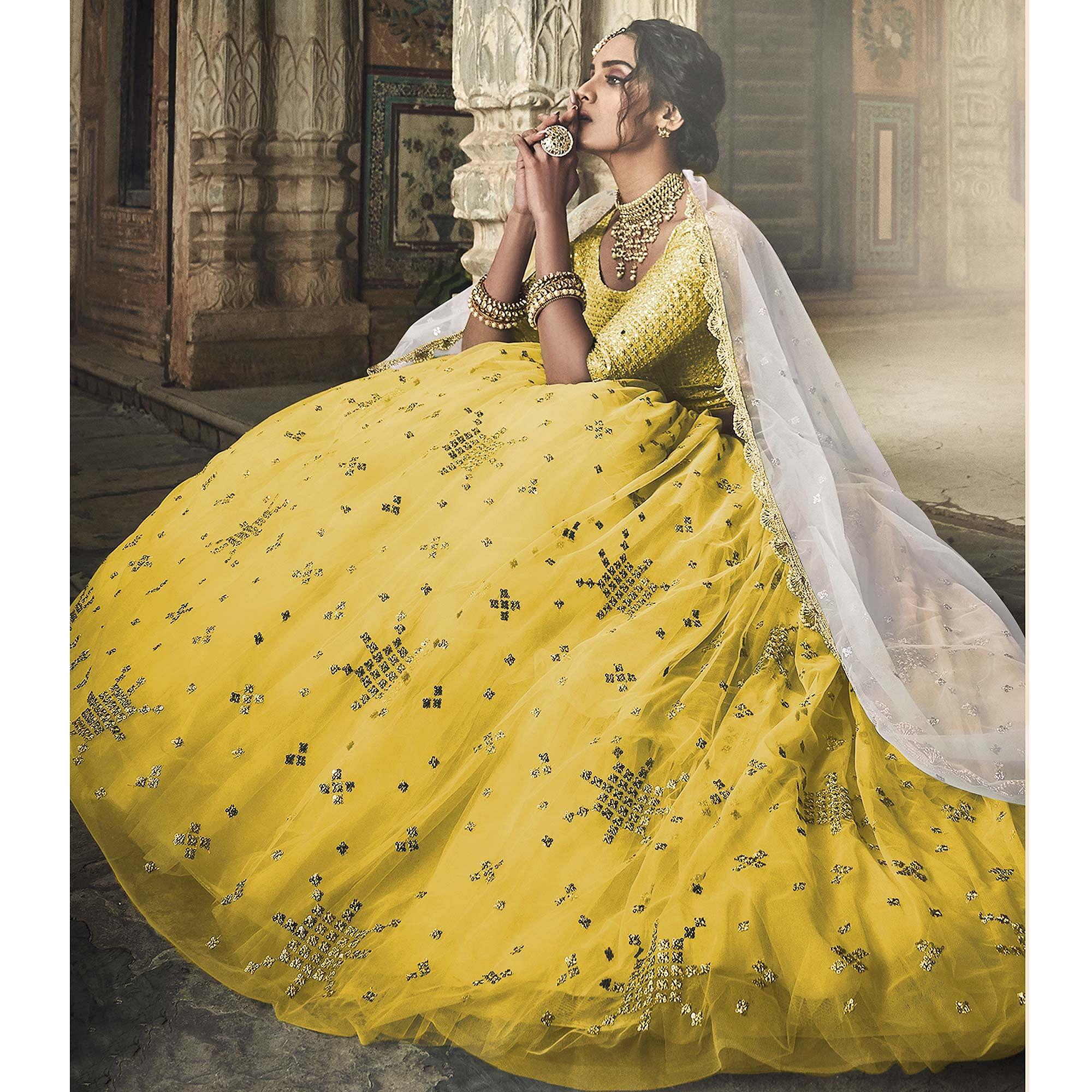 Yellow Sequence Embroidered Net Lehenga Choli - Peachmode